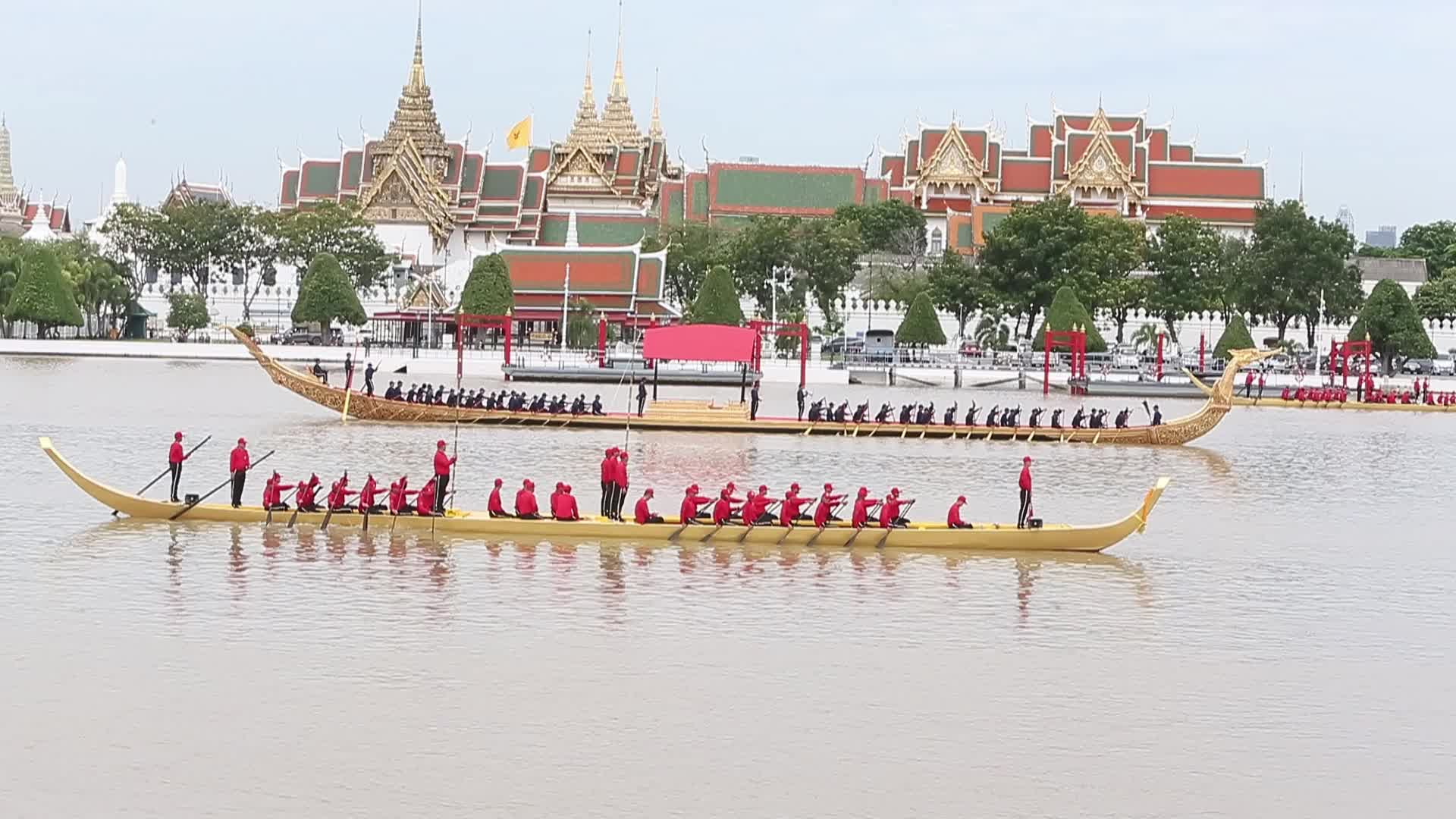 Thai Oarsmen Row Royal Barges During Practice Procession on Chao Phraya River