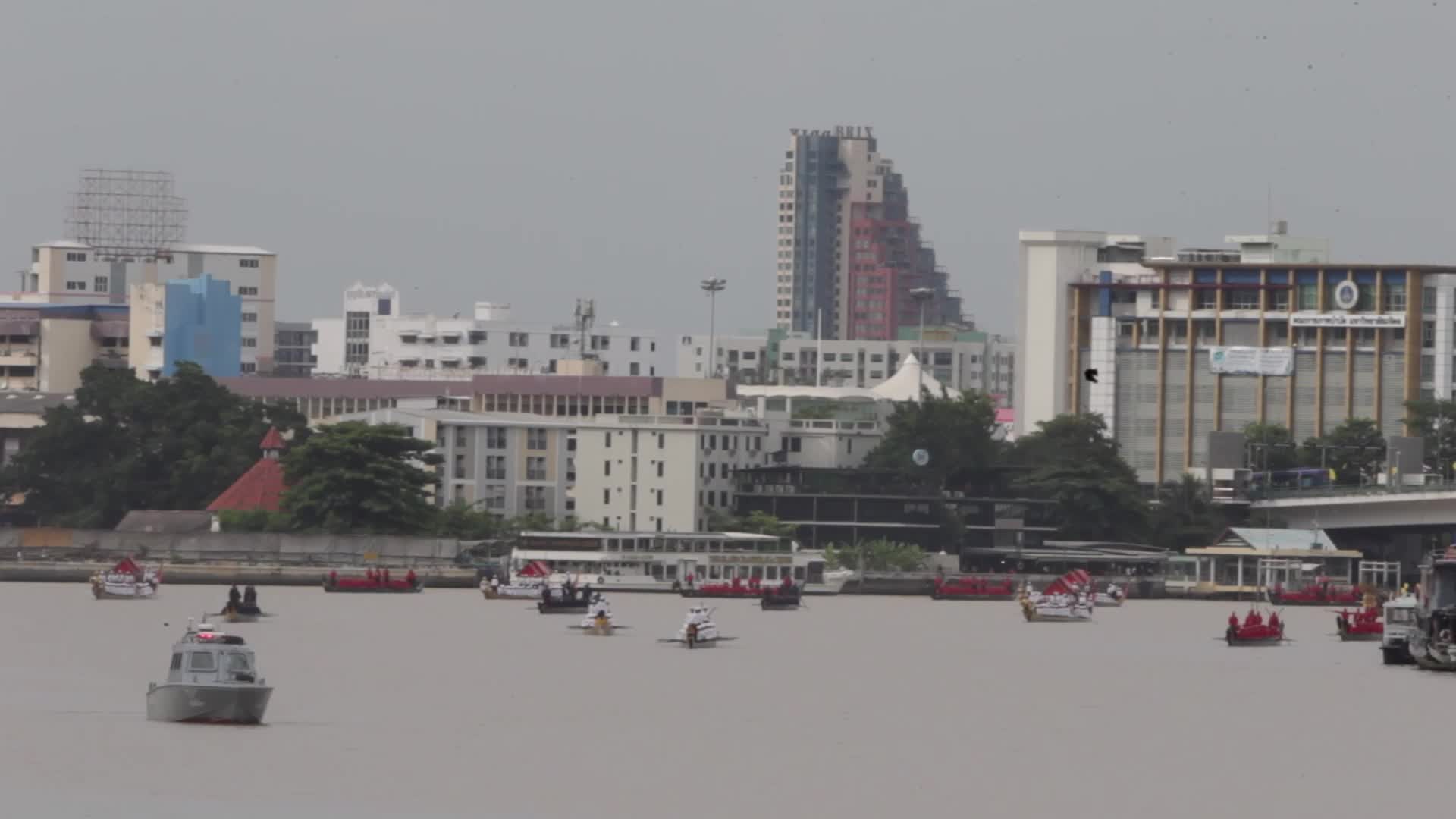 Thai Oarsmen Row Royal Barges During Practice Procession on Chao Phraya River