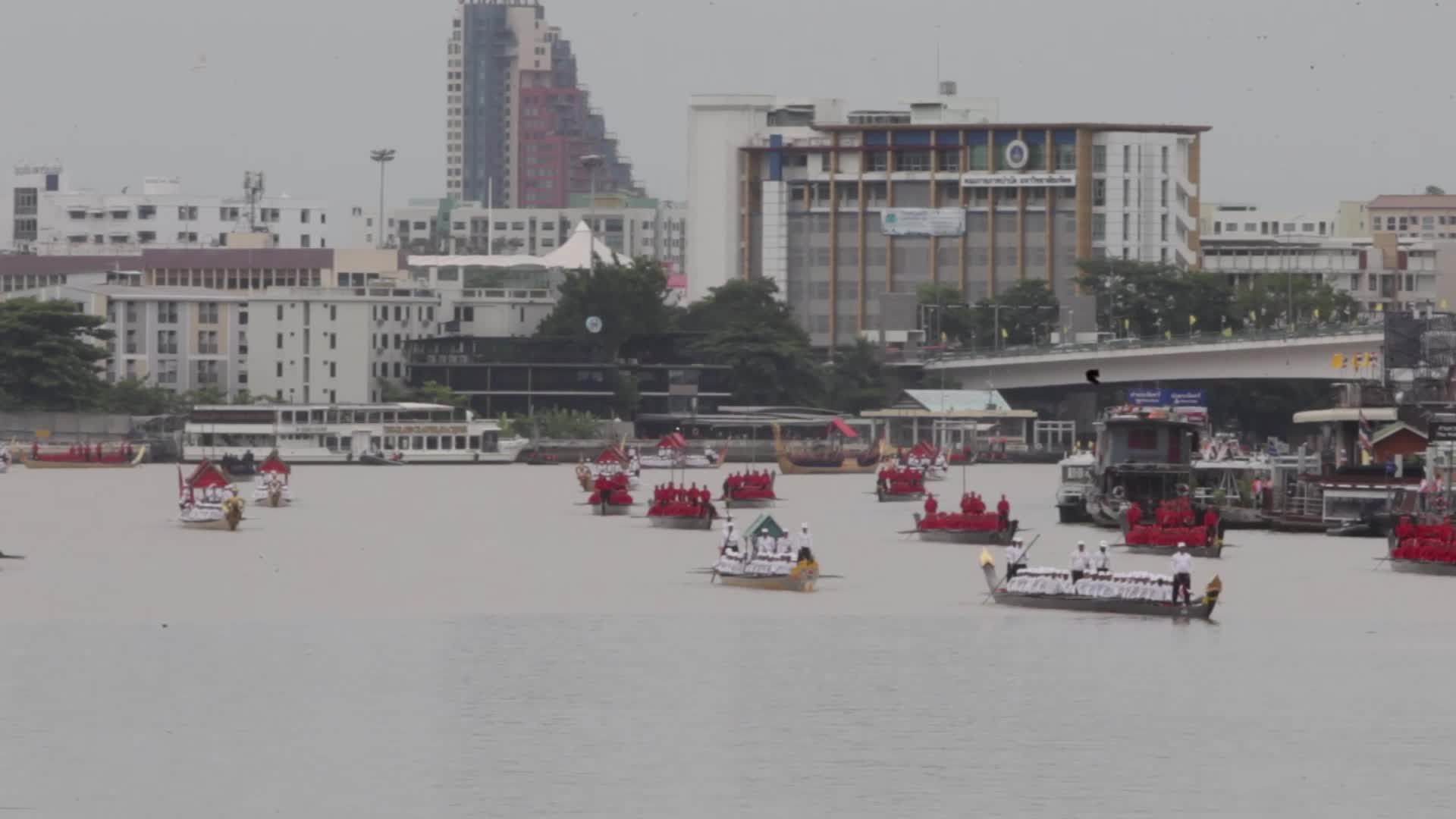 Thai Oarsmen Row Royal Barges During Practice Procession on Chao Phraya River