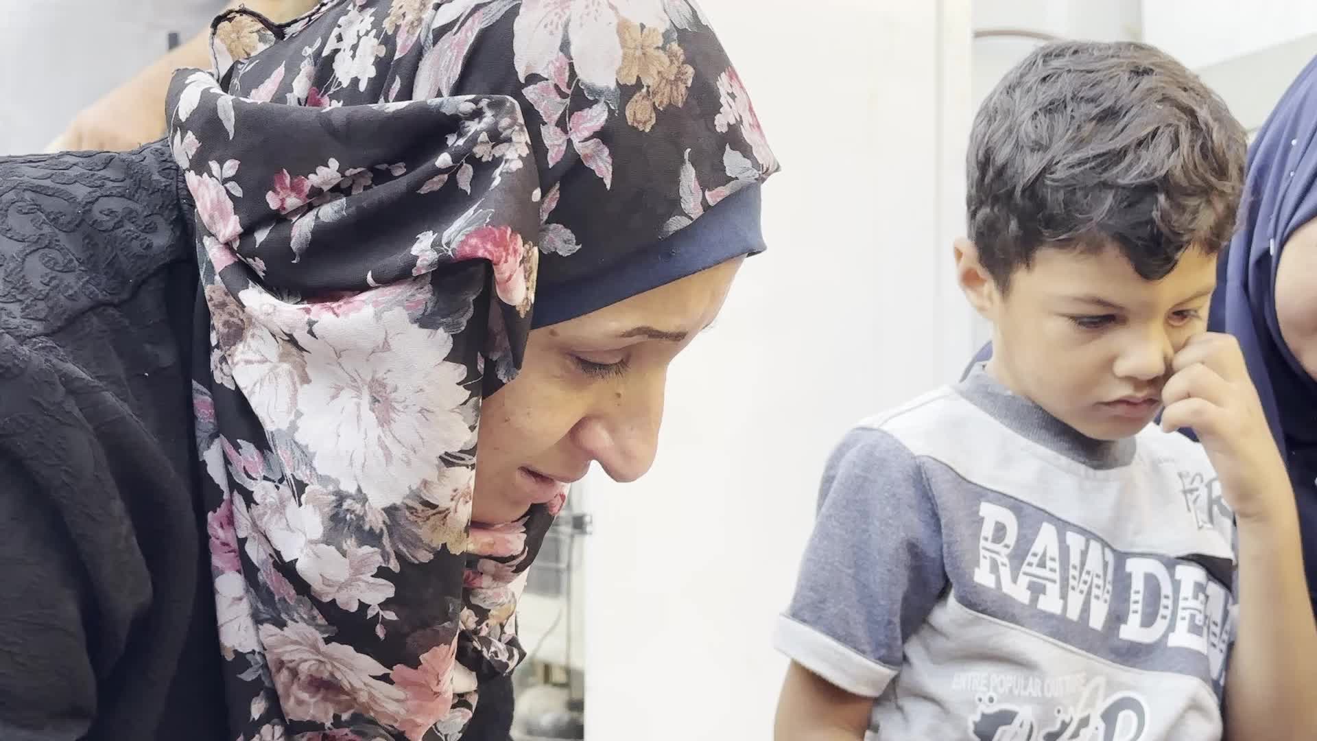 Palestinians Mourn Family Member After Overnight Israeli Strike on Temporary Shelters in Gaza Hospital Courtyard