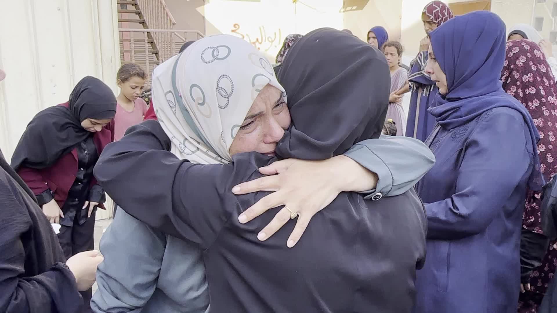 Palestinians Mourn Family Member After Overnight Israeli Strike on Temporary Shelters in Gaza Hospital Courtyard