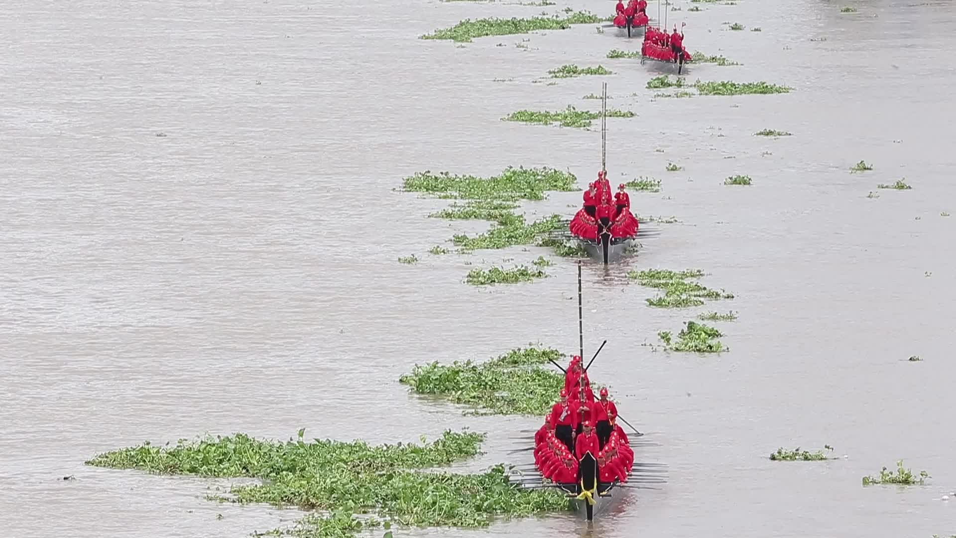 Thai Oarsmen Row Royal Barges on Chao Phraya River During Practice Procession for Upcoming Royal Kathin Ceremony