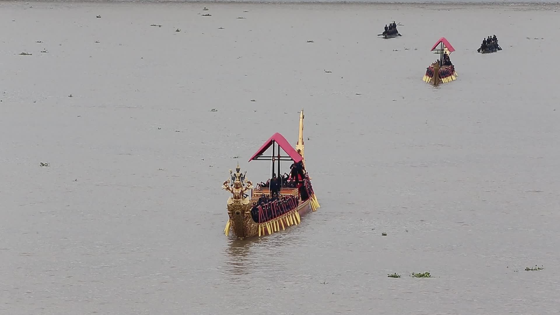 Thai Oarsmen Row Royal Barges on Chao Phraya River During Practice Procession for Upcoming Royal Kathin Ceremony