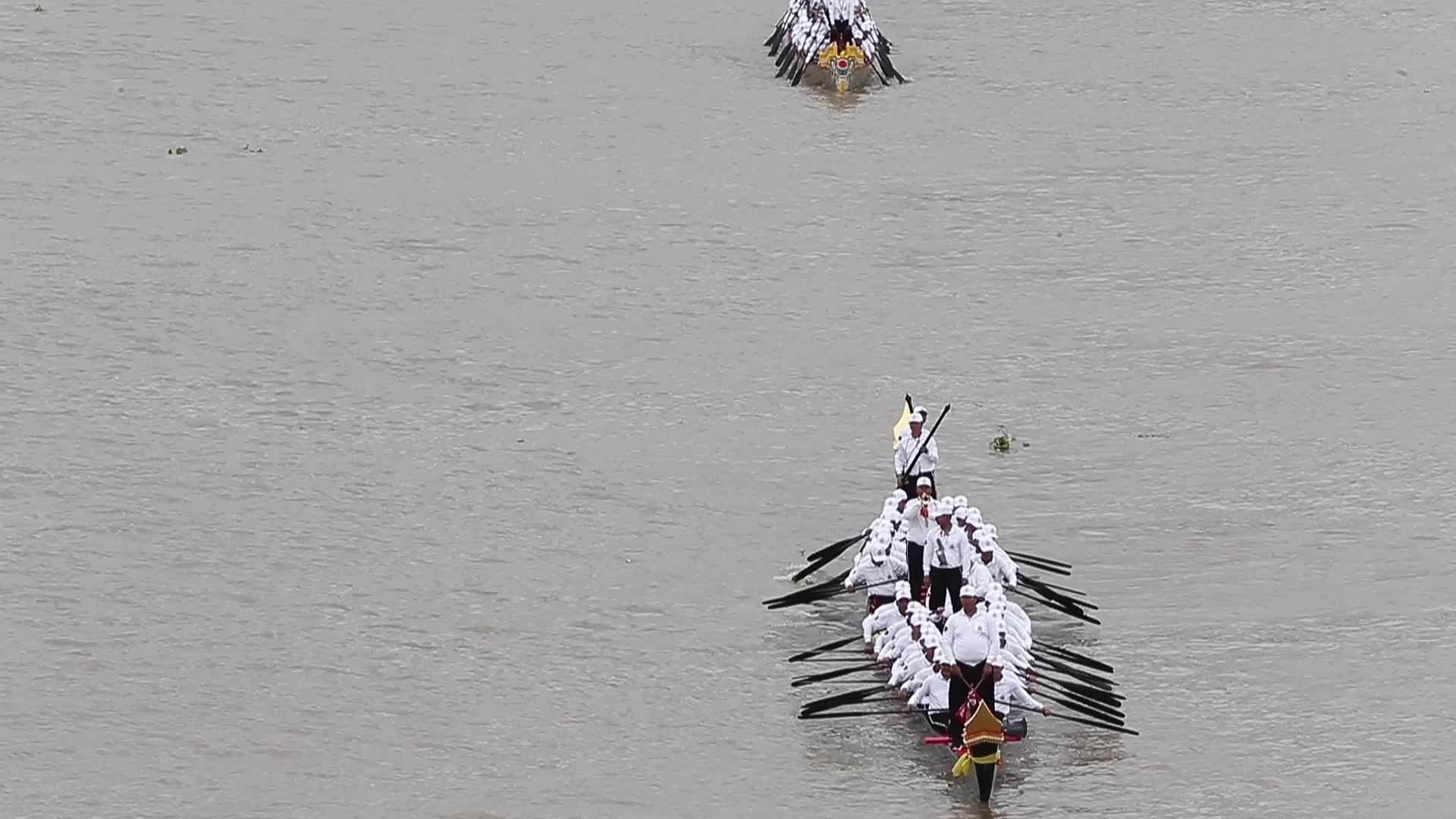 Thai Oarsmen Row Royal Barges on Chao Phraya River During Practice Procession for Upcoming Royal Kathin Ceremony