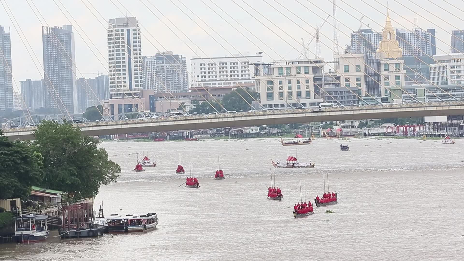 Thai Oarsmen Row Royal Barges on Chao Phraya River During Practice Procession for Upcoming Royal Kathin Ceremony
