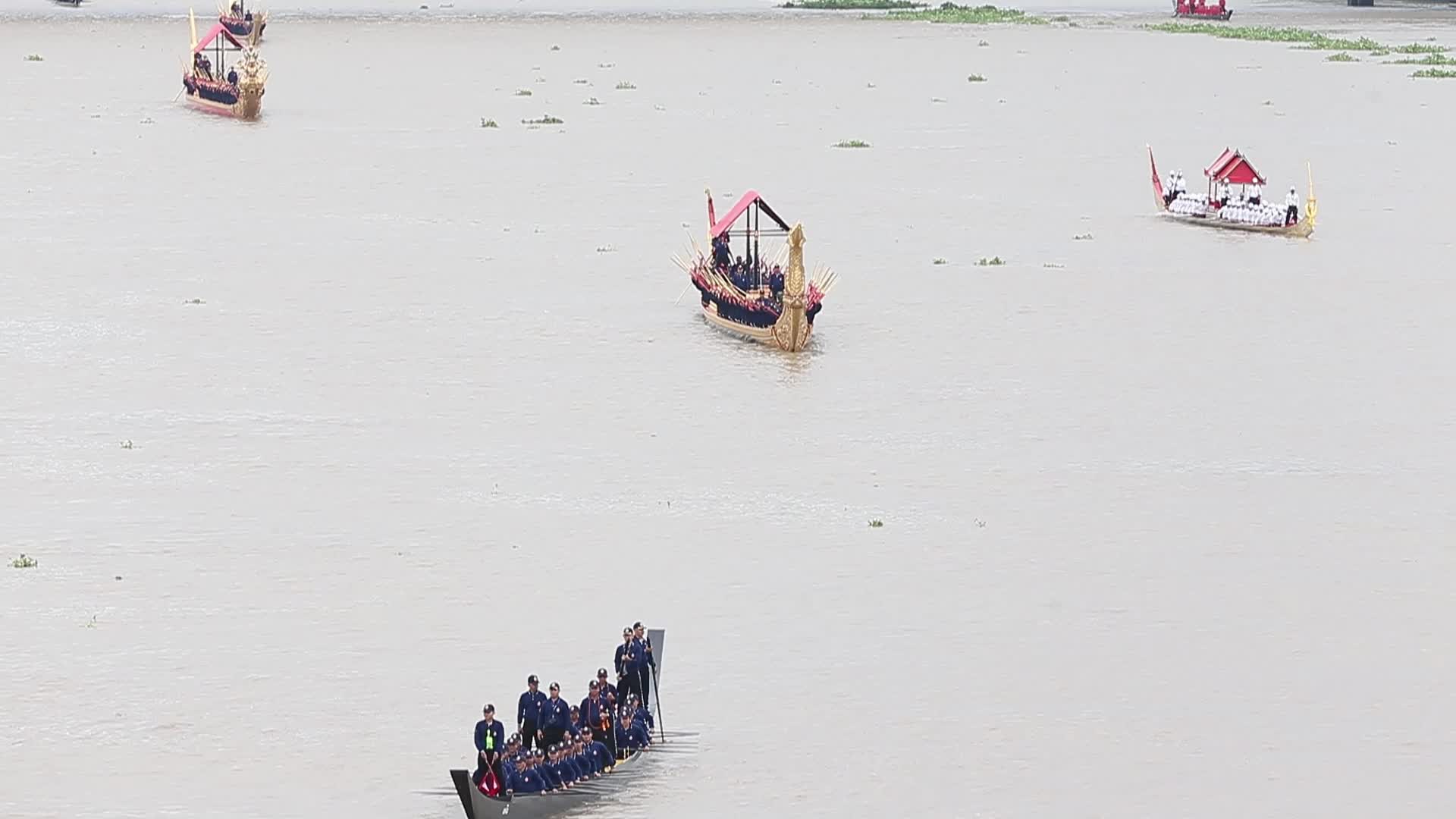 Thai Oarsmen Row Royal Barges on Chao Phraya River During Practice Procession for Upcoming Royal Kathin Ceremony
