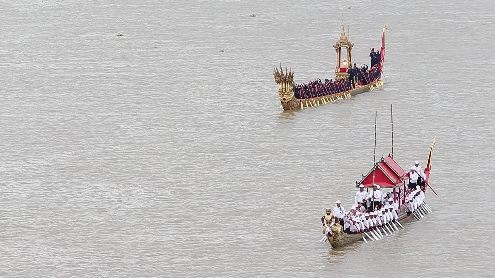 Thai Oarsmen Row Royal Barges on Chao Phraya River During Practice Procession for Upcoming Royal Kathin Ceremony