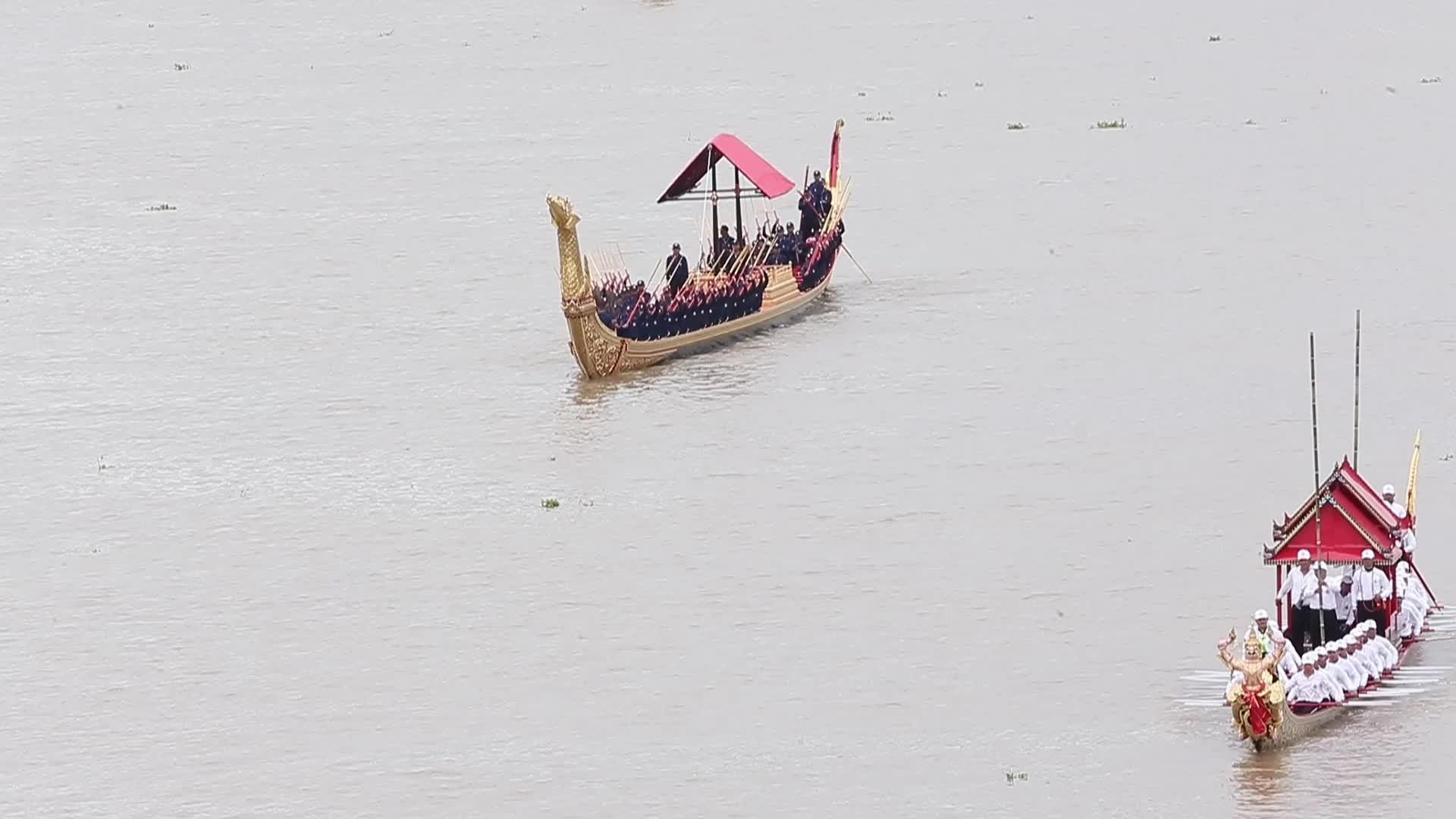 Thai Oarsmen Row Royal Barges on Chao Phraya River During Practice Procession for Upcoming Royal Kathin Ceremony