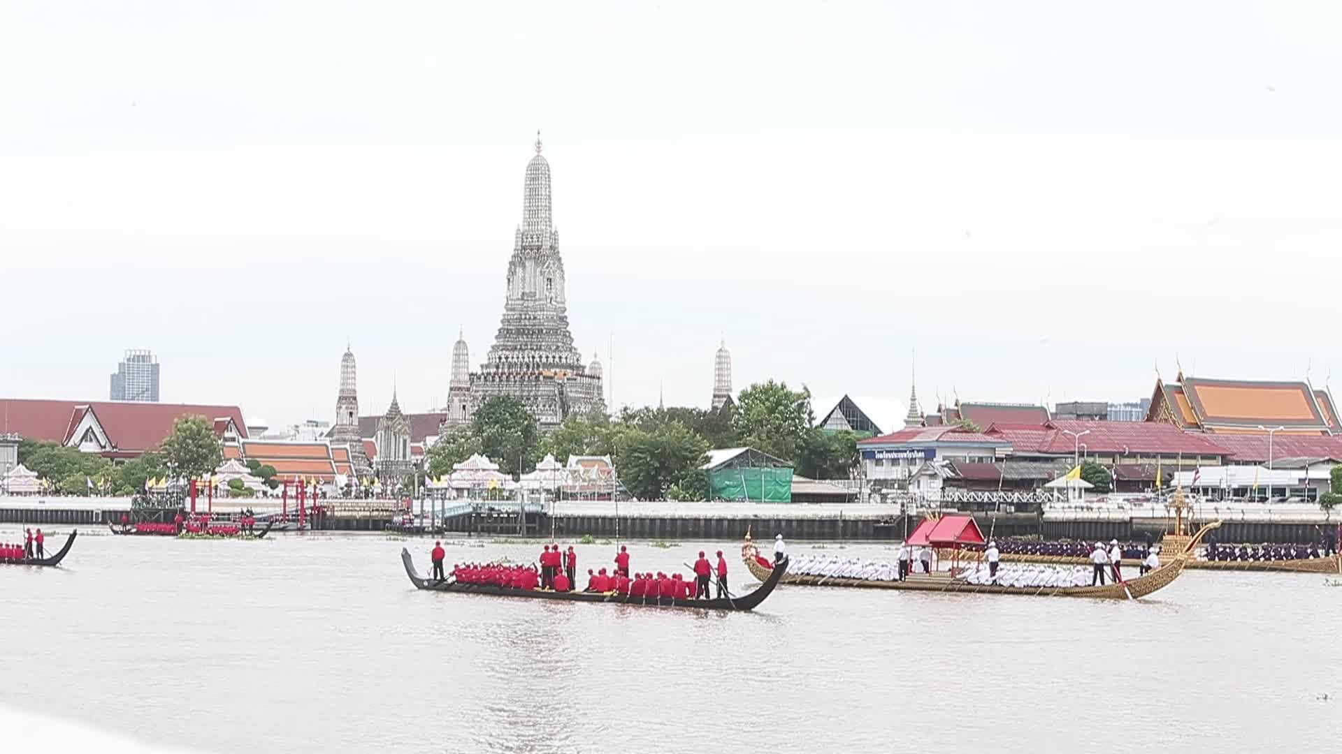 Thai Oarsmen Row Royal Barges on Chao Phraya River During Practice Procession for Upcoming Royal Kathin Ceremony