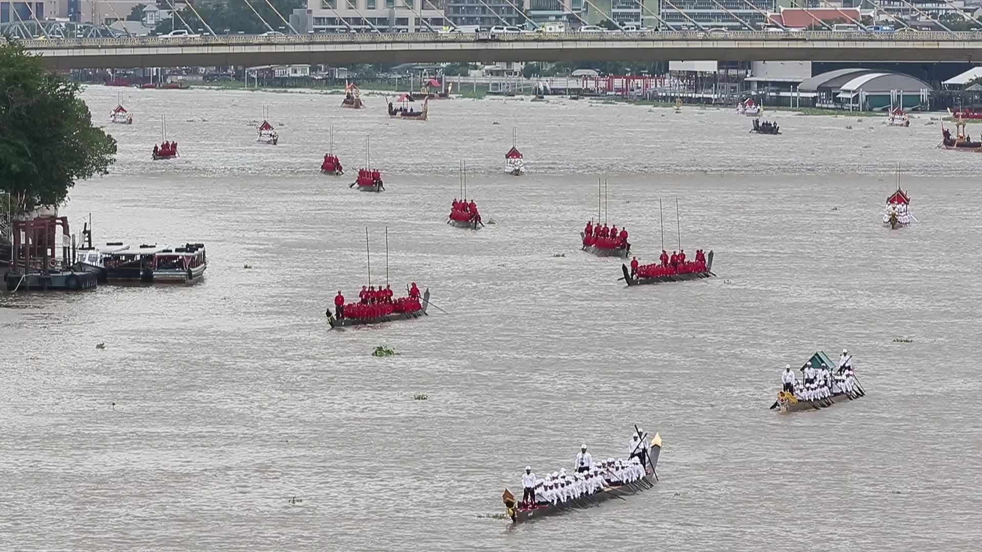 Thai Oarsmen Row Royal Barges on Chao Phraya River During Practice Procession for Upcoming Royal Kathin Ceremony