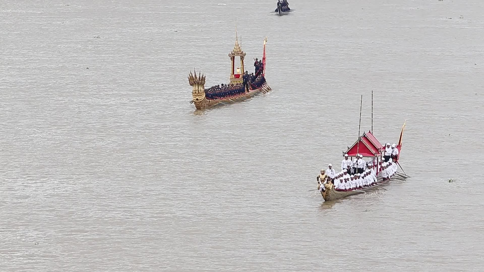 Thai Oarsmen Row Royal Barges on Chao Phraya River During Practice Procession for Upcoming Royal Kathin Ceremony