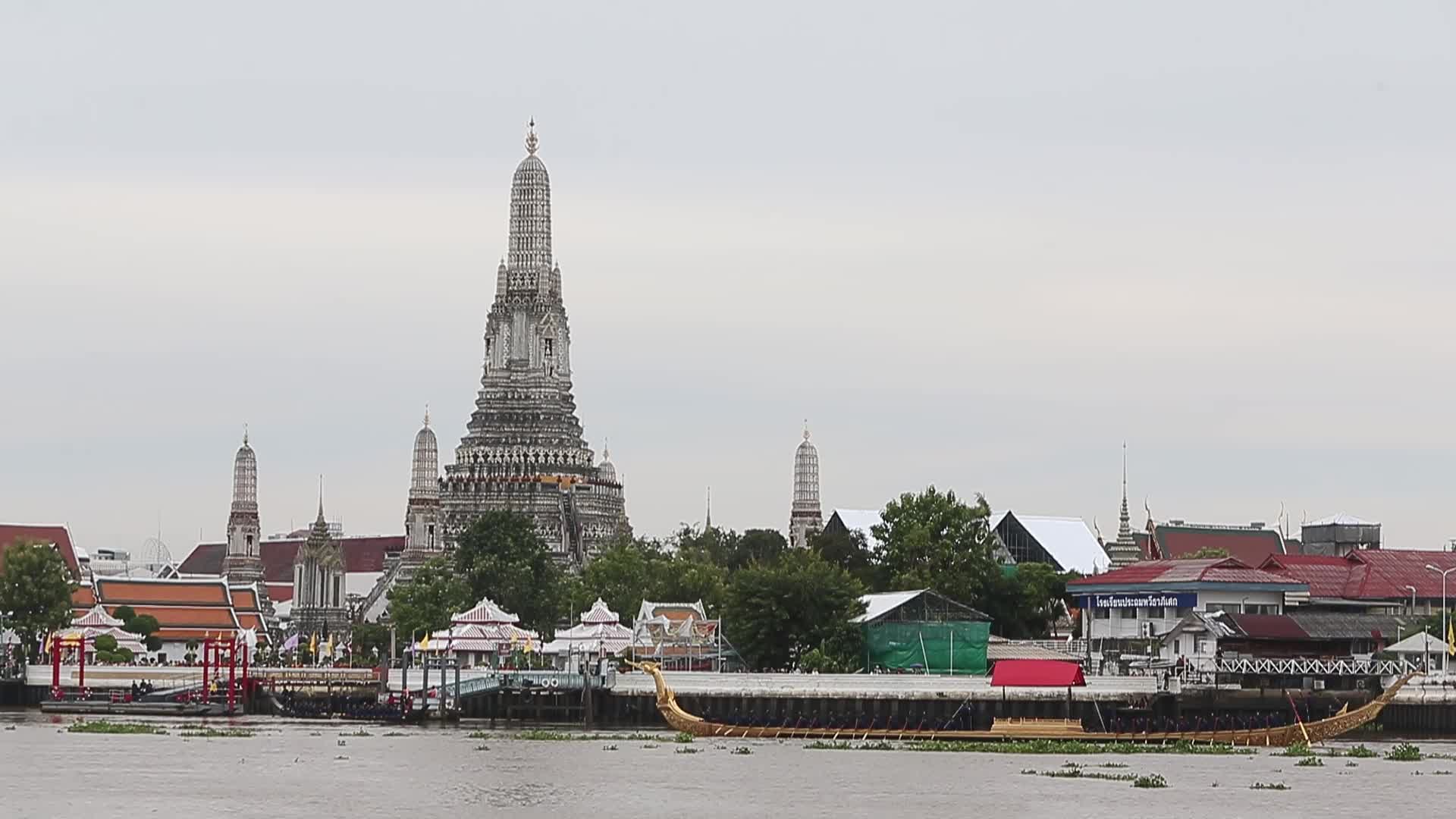 Thai Oarsmen Row Royal Barges on Chao Phraya River During Practice Procession for Upcoming Royal Kathin Ceremony