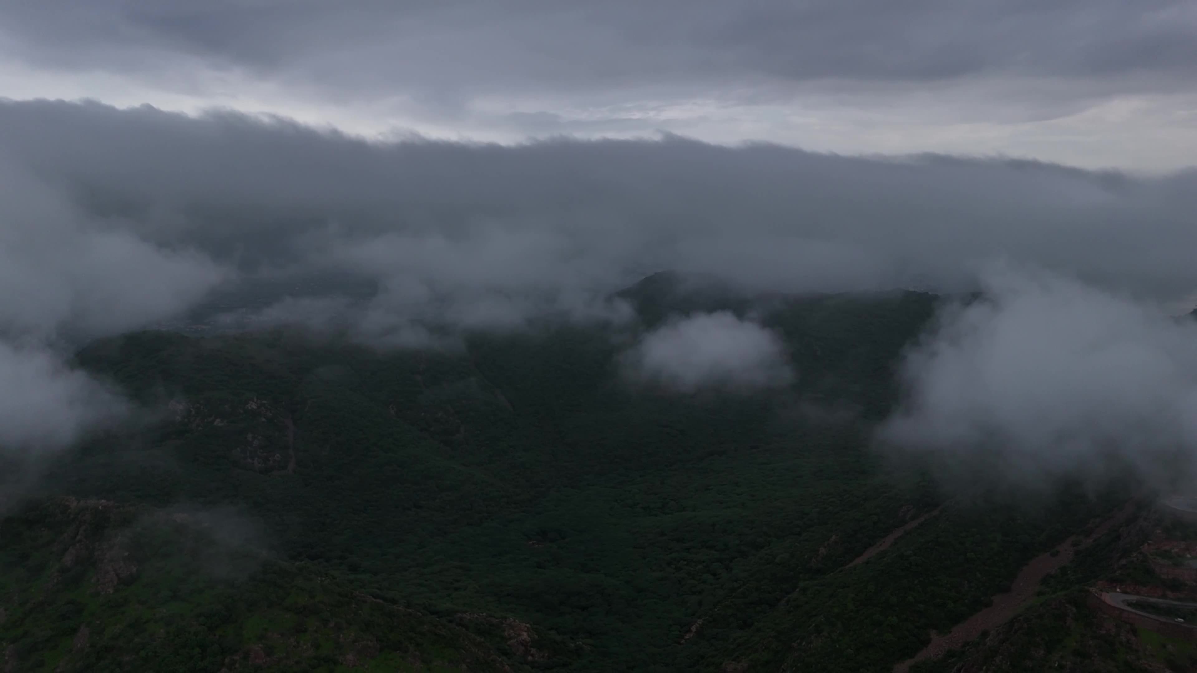 Clouds Hover Over The Mountains During The Monsoon Rain