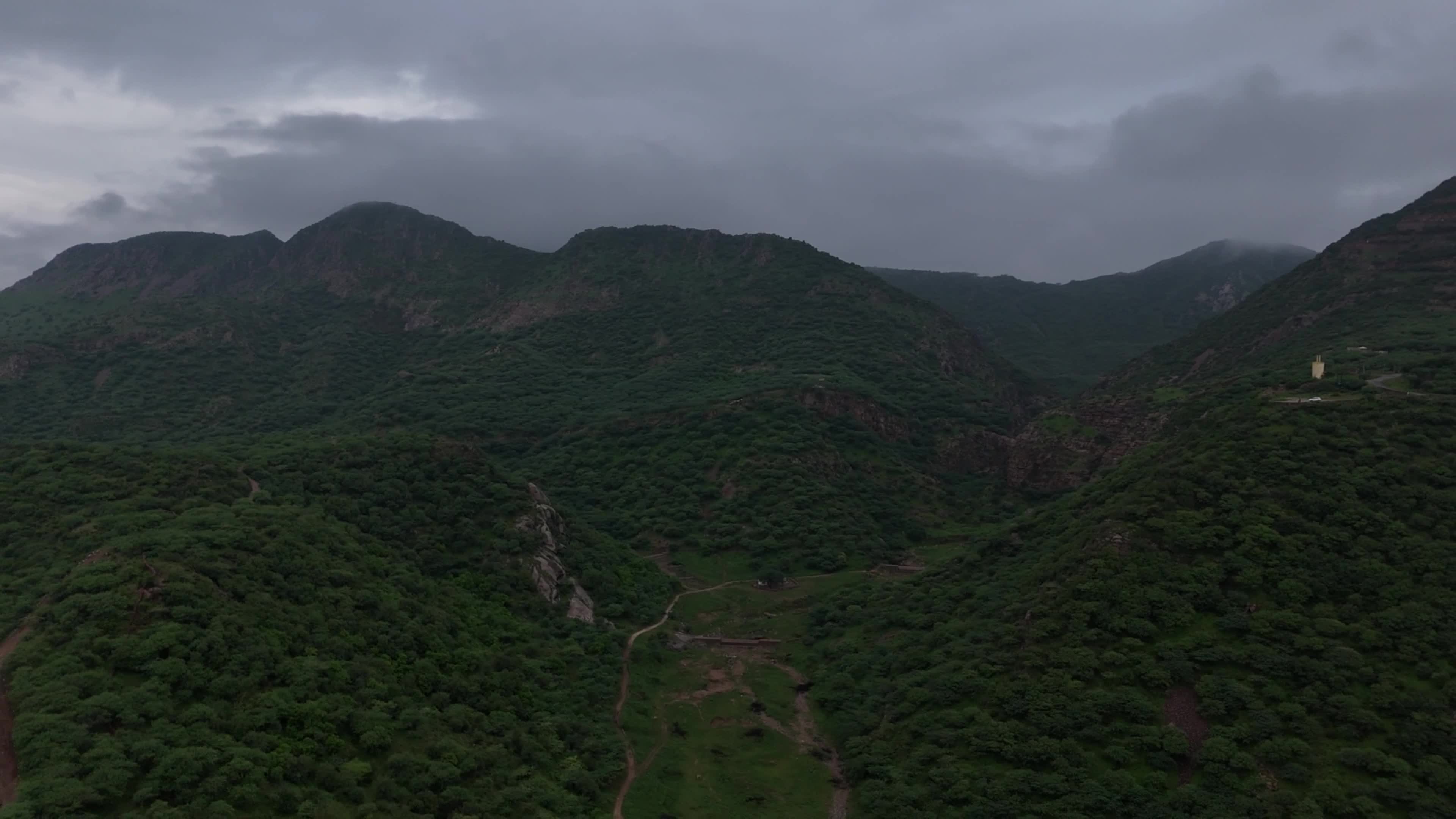 Clouds Hover Over The Mountains During The Monsoon Rain
