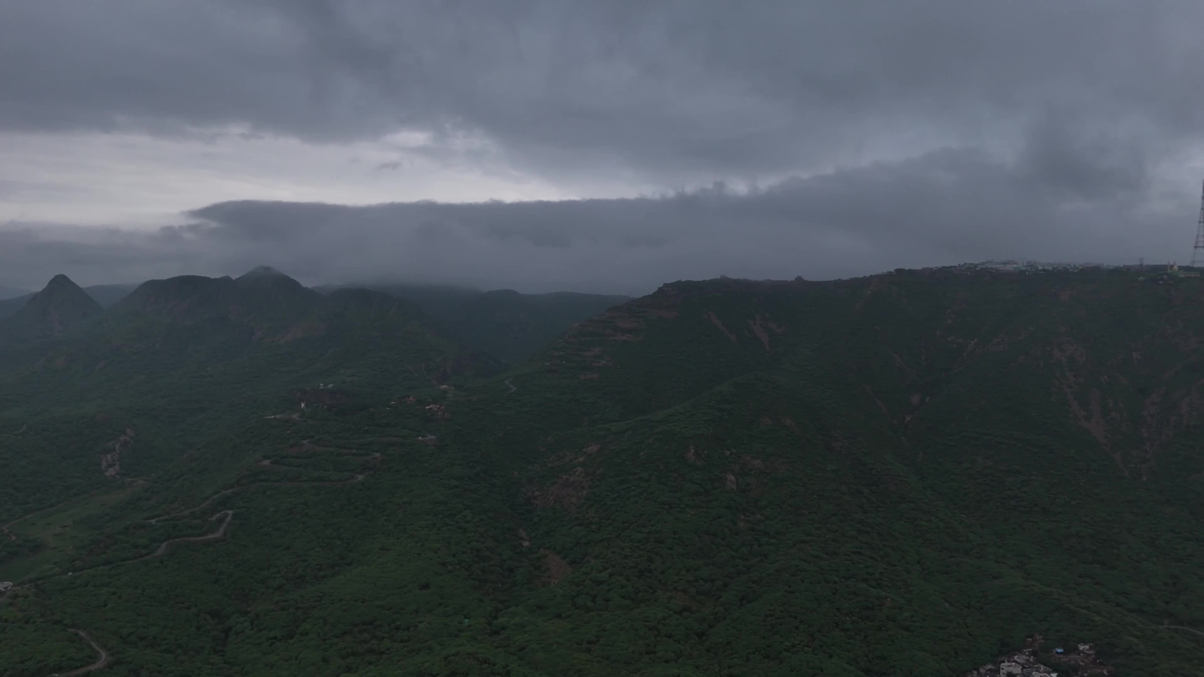 Clouds Hover Over The Mountains During The Monsoon Rain