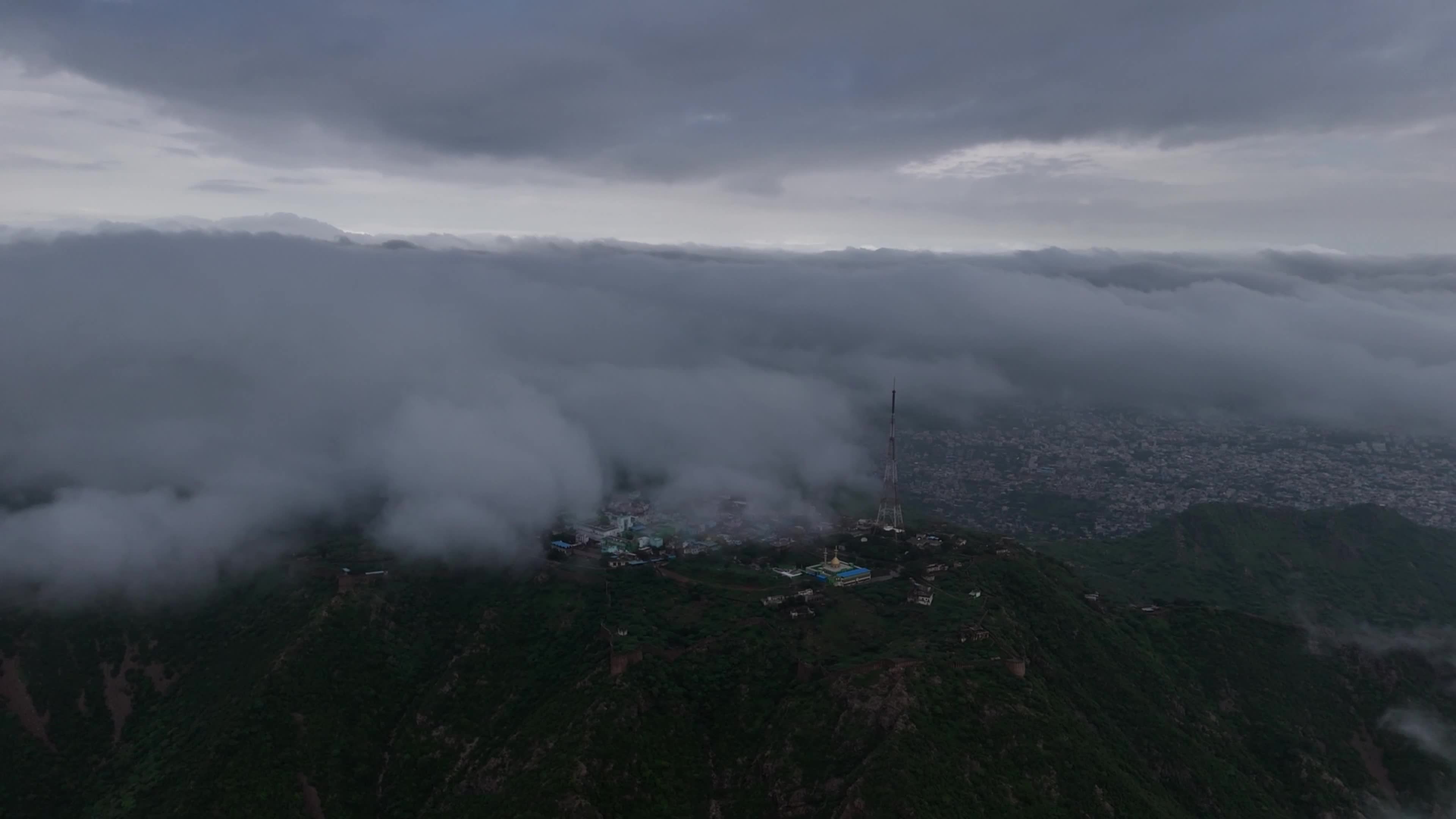 Clouds Hover Over The Mountains During The Monsoon Rain