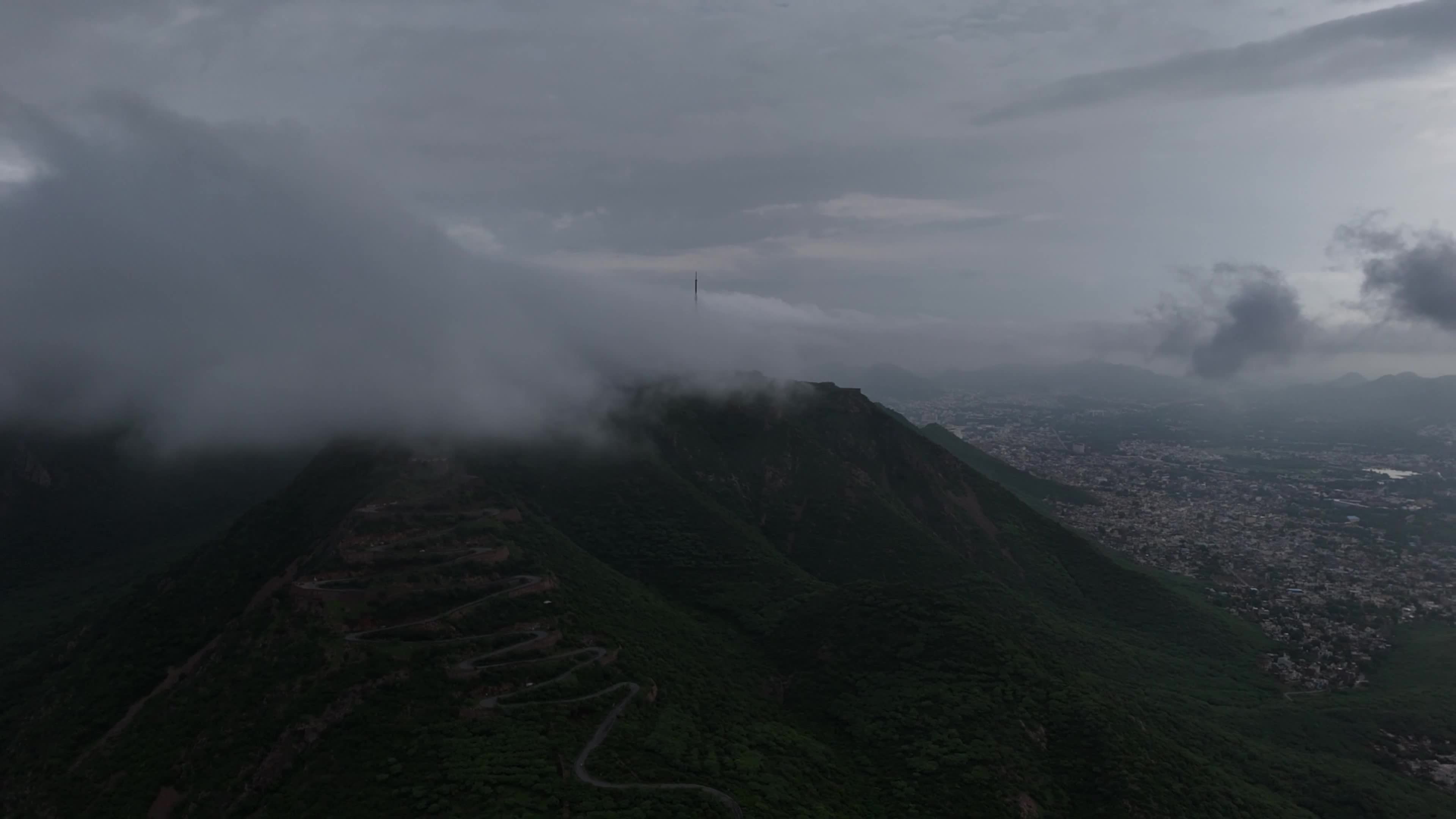 Clouds Hover Over The Mountains During The Monsoon Rain