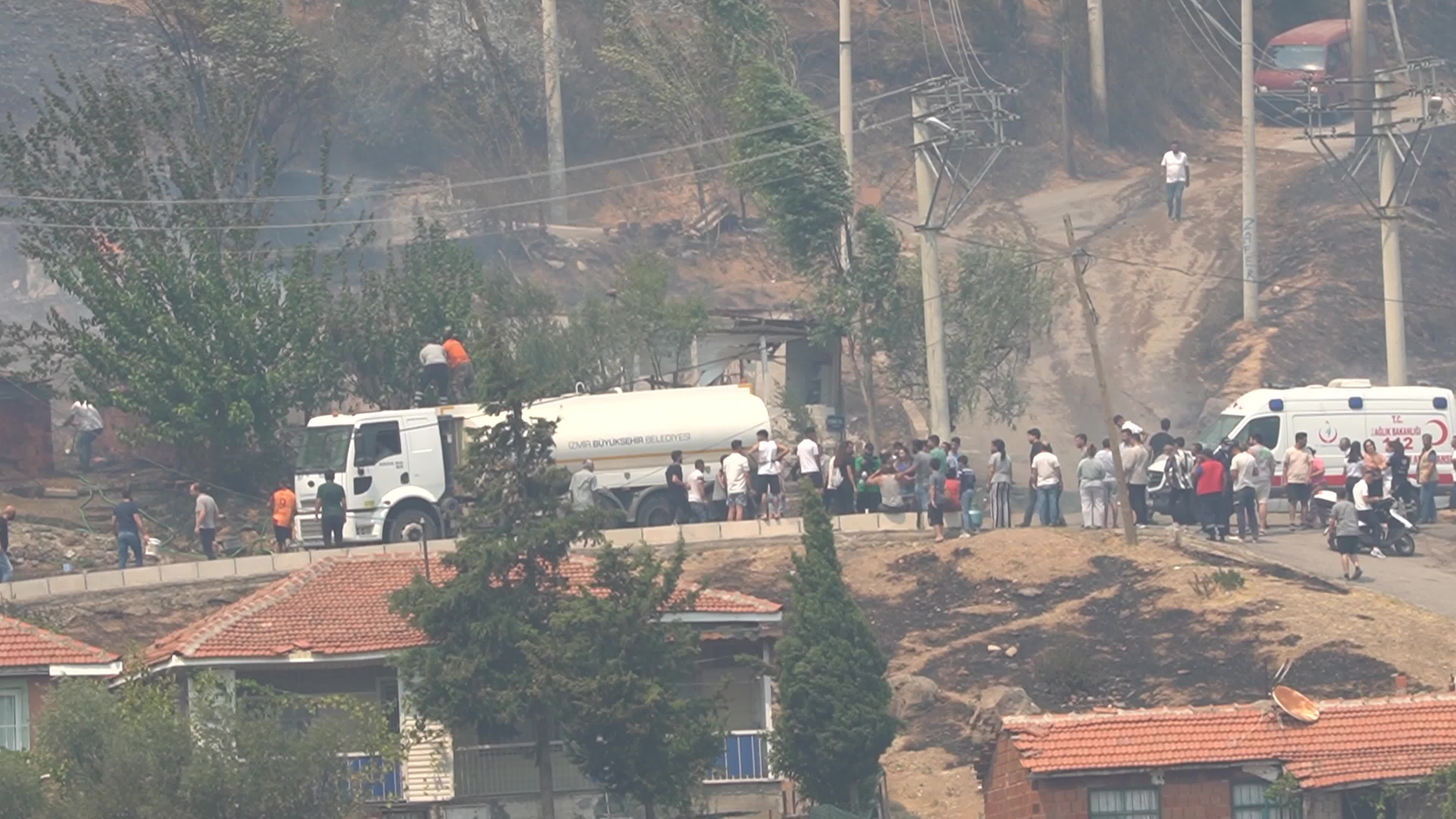 Wildfire has reached into the residential area, Bayrakli, Izmir, Turkey