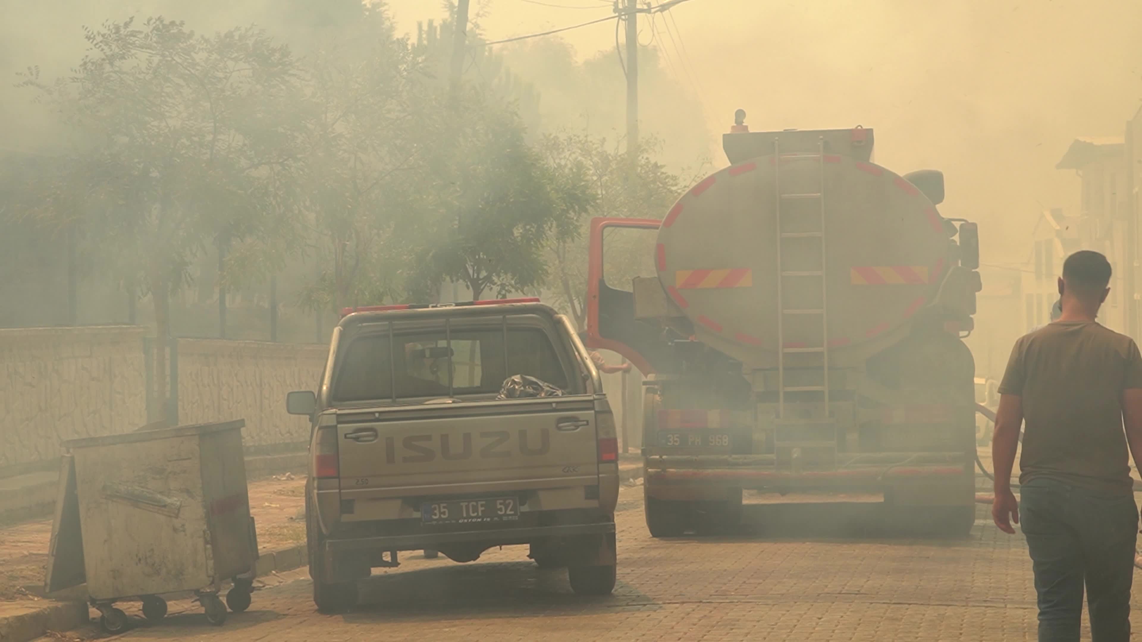 Wildfire has reached into the residential area, Bayrakli, Izmir, Turkey