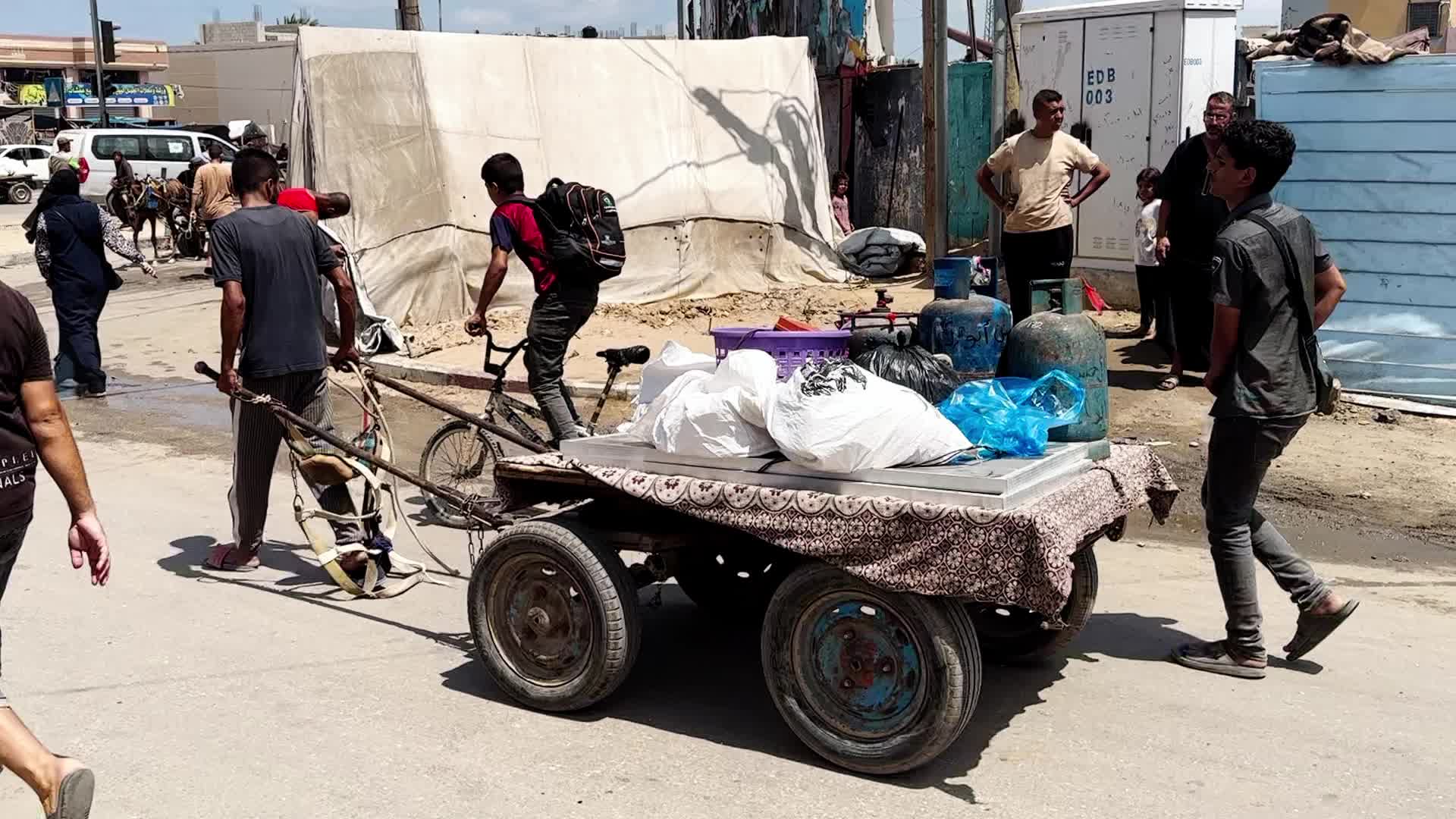 Palestinians Flee With Belongings in Deir el-Balah, Gaza, Amid Ongoing Israel-Hamas Conflict 
