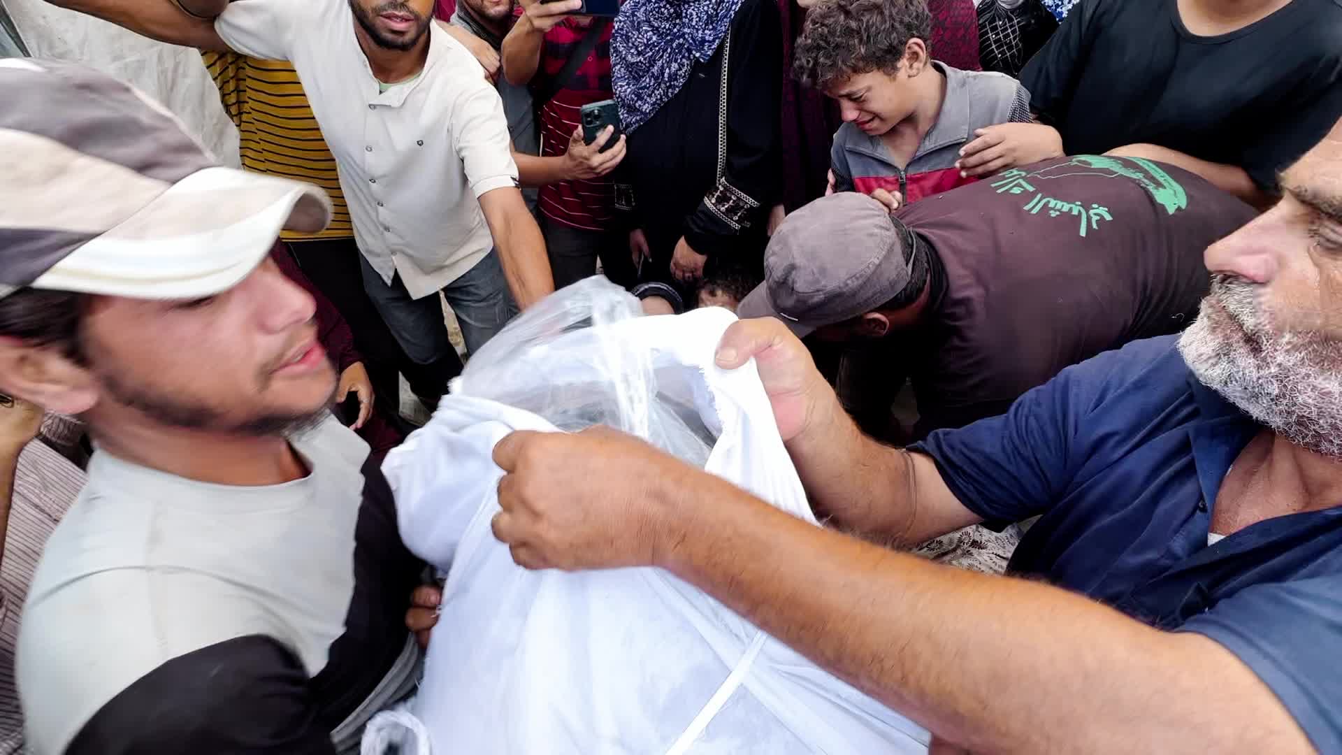 Victims of Israeli Attacks in Az-Zawayda District Brought to Al-Aqsa Martyrs Hospital Morgue in Gaza