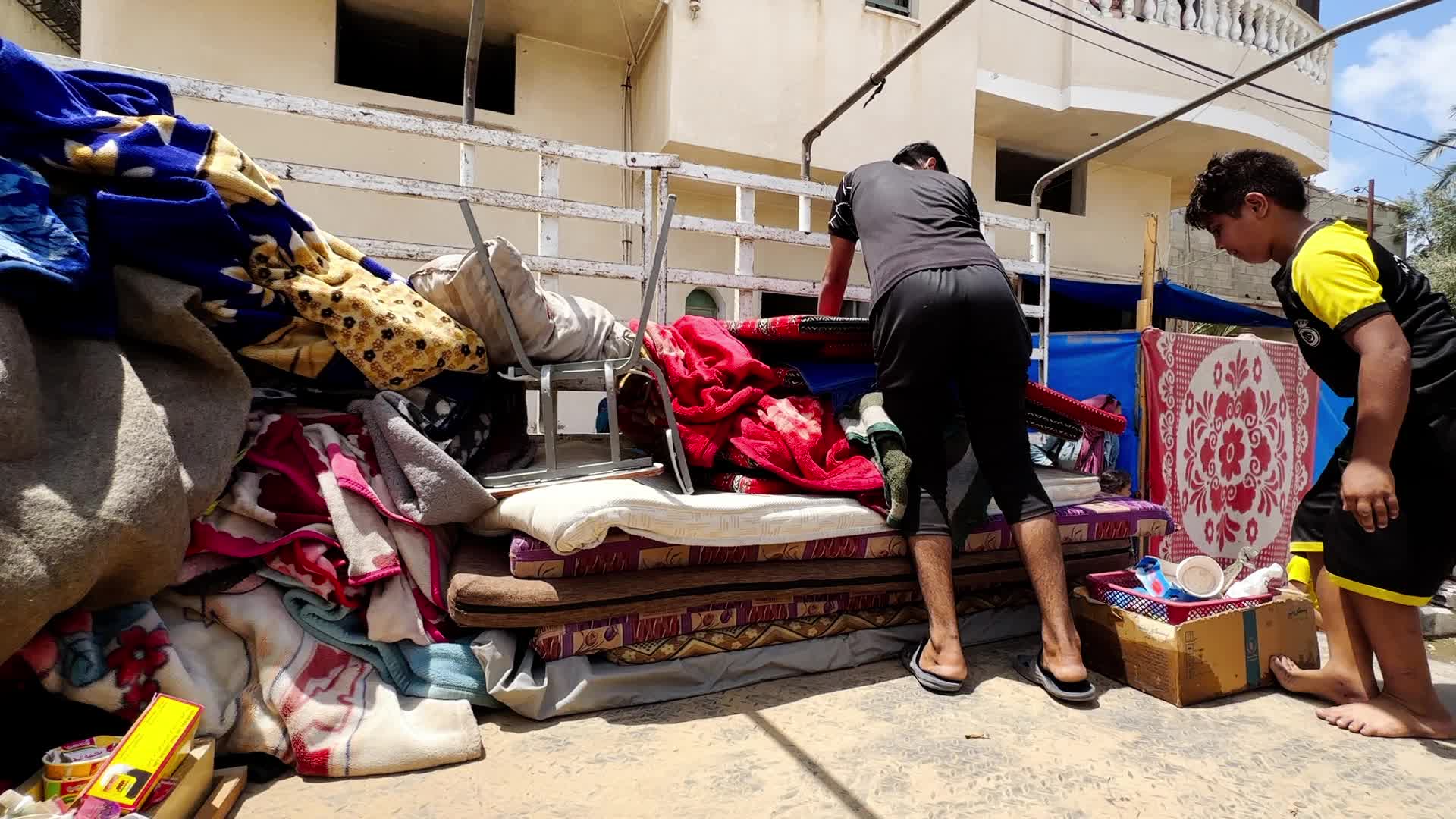 Palestinians Flee With Belongings in Deir el-Balah, Gaza, Amid Ongoing Israel-Hamas Conflict 