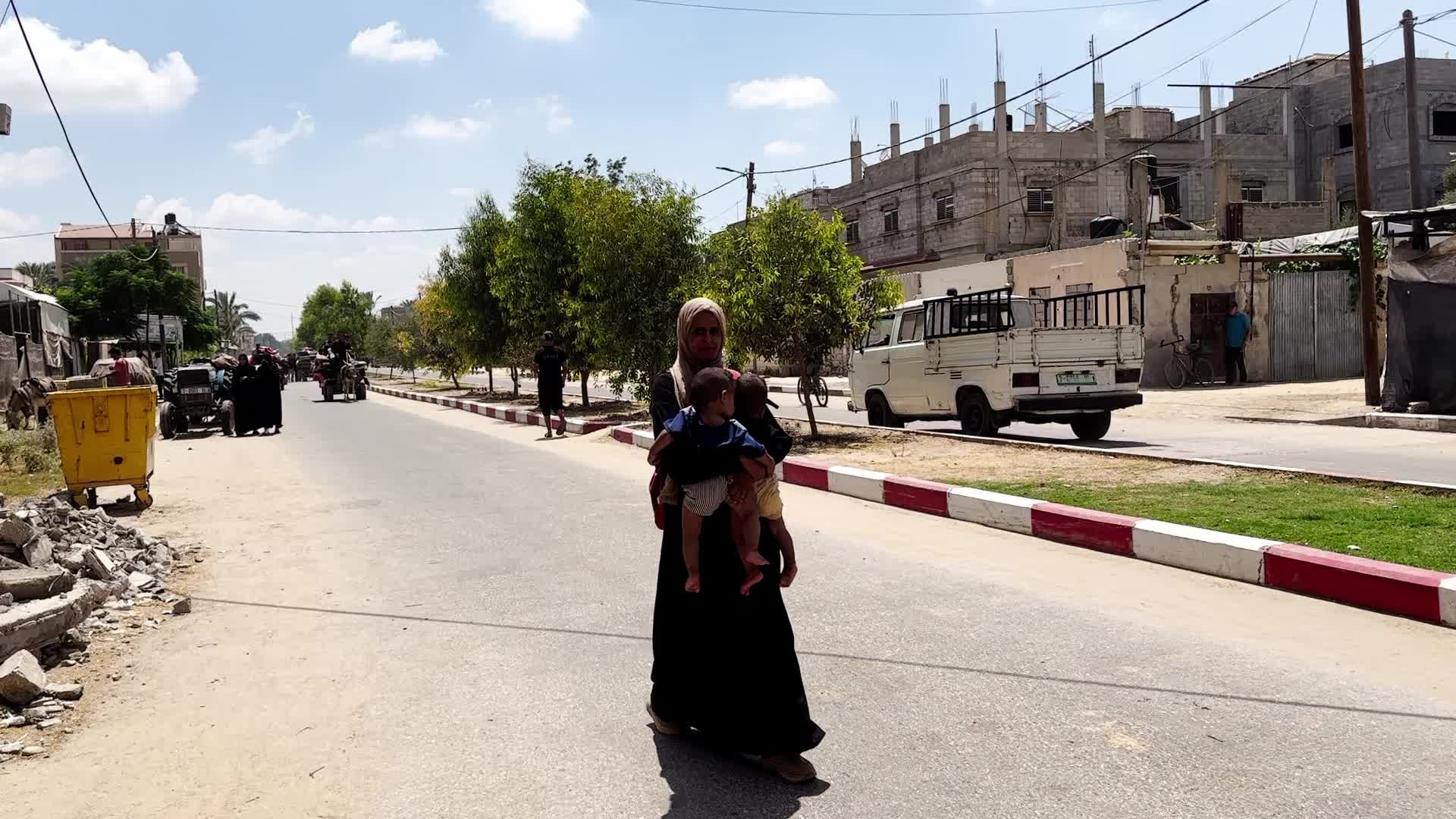 Palestinians Flee With Belongings in Deir el-Balah, Gaza, Amid Ongoing Israel-Hamas Conflict 