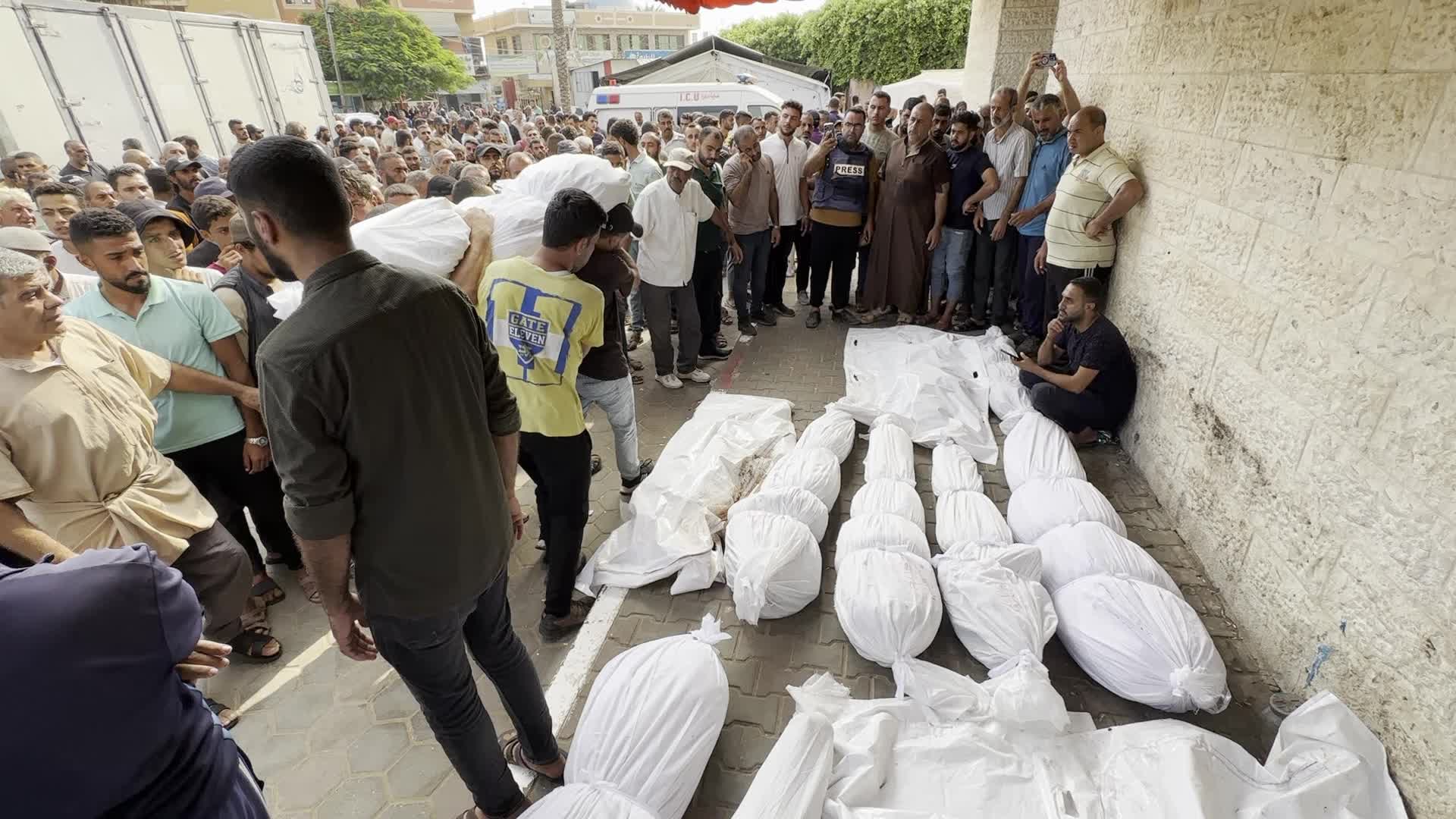 Palestinians Mourn Relatives Killed in Israeli Strike at Al-Aqsa Martyrs Hospital in Gaza
