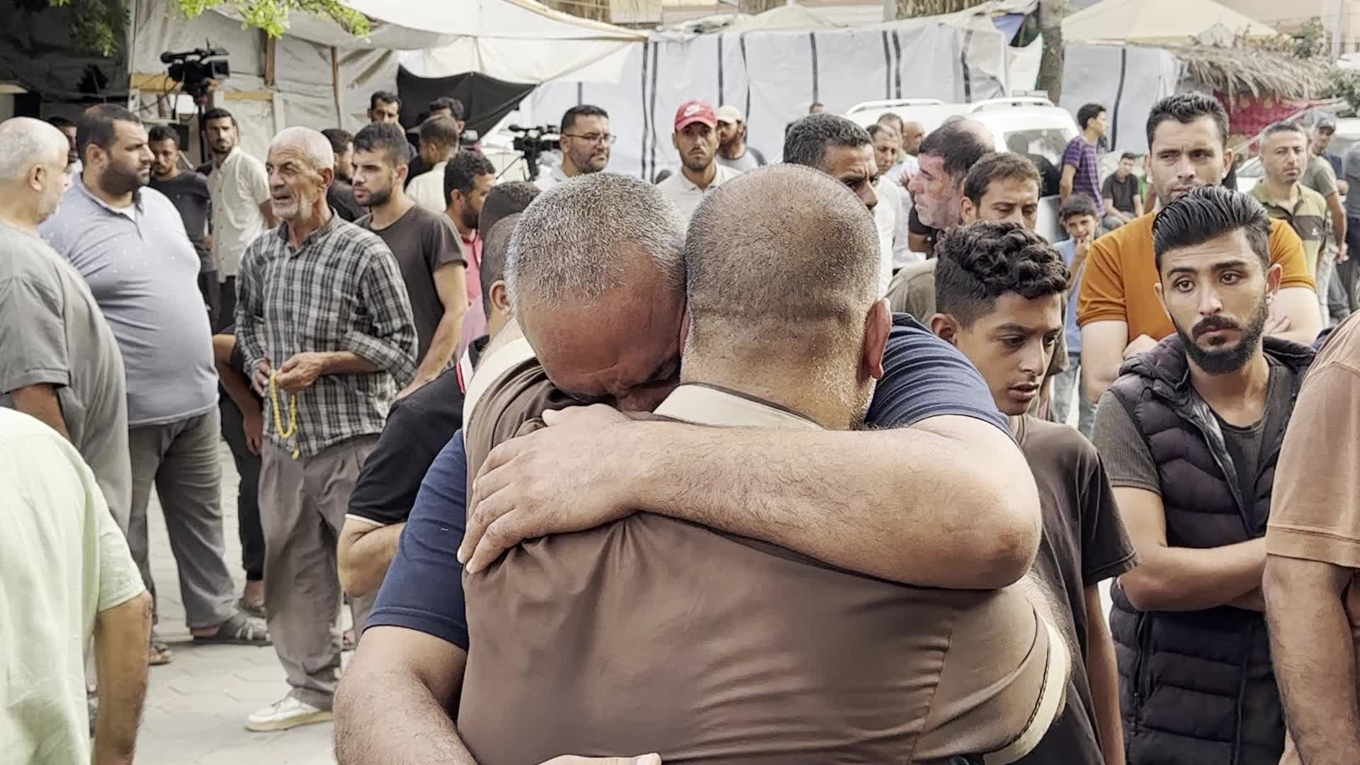 Palestinians Mourn Relatives Killed in Israeli Strike at Al-Aqsa Martyrs Hospital in Gaza