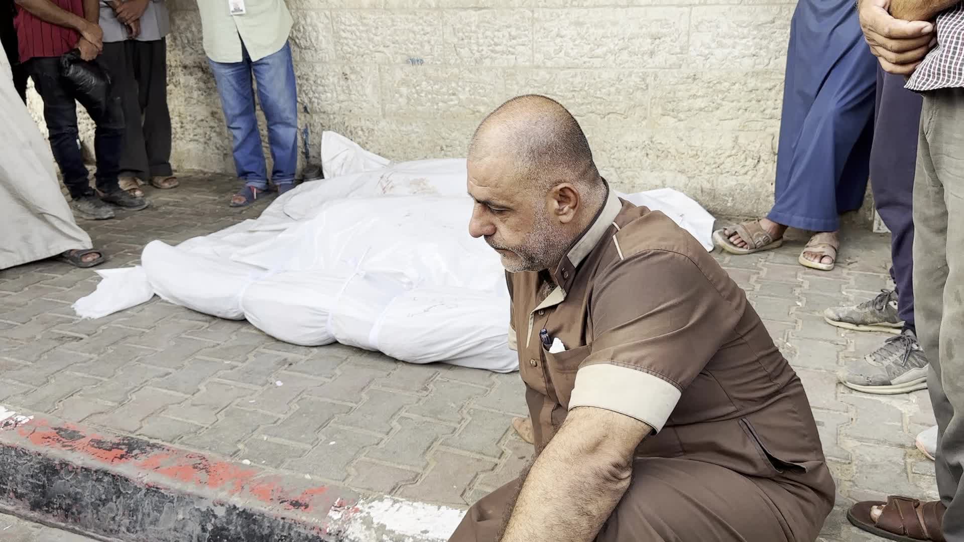 Palestinians Mourn Relatives Killed in Israeli Strike at Al-Aqsa Martyrs Hospital in Gaza
