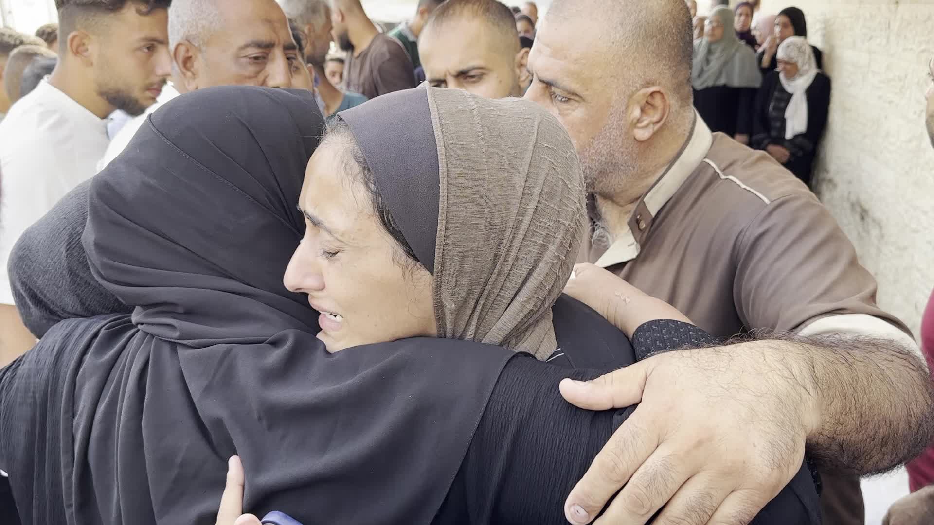 Palestinians Mourn Relatives Killed in Israeli Strike at Al-Aqsa Martyrs Hospital in Gaza