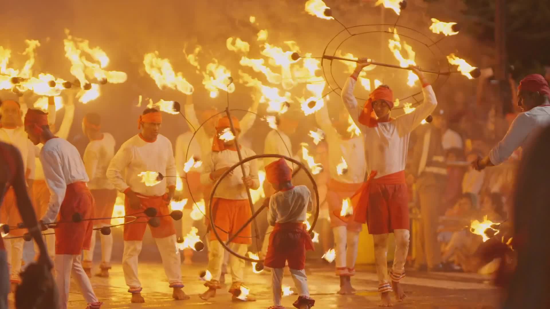 Fire acrobats are a mesmerizing highlight of the Kandy Esala Perahera