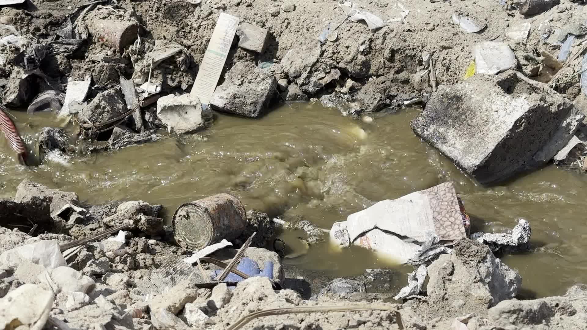 Displaced Palestinians Near Raw Sewage at Camp in Deir al-Balah, Gaza Strip