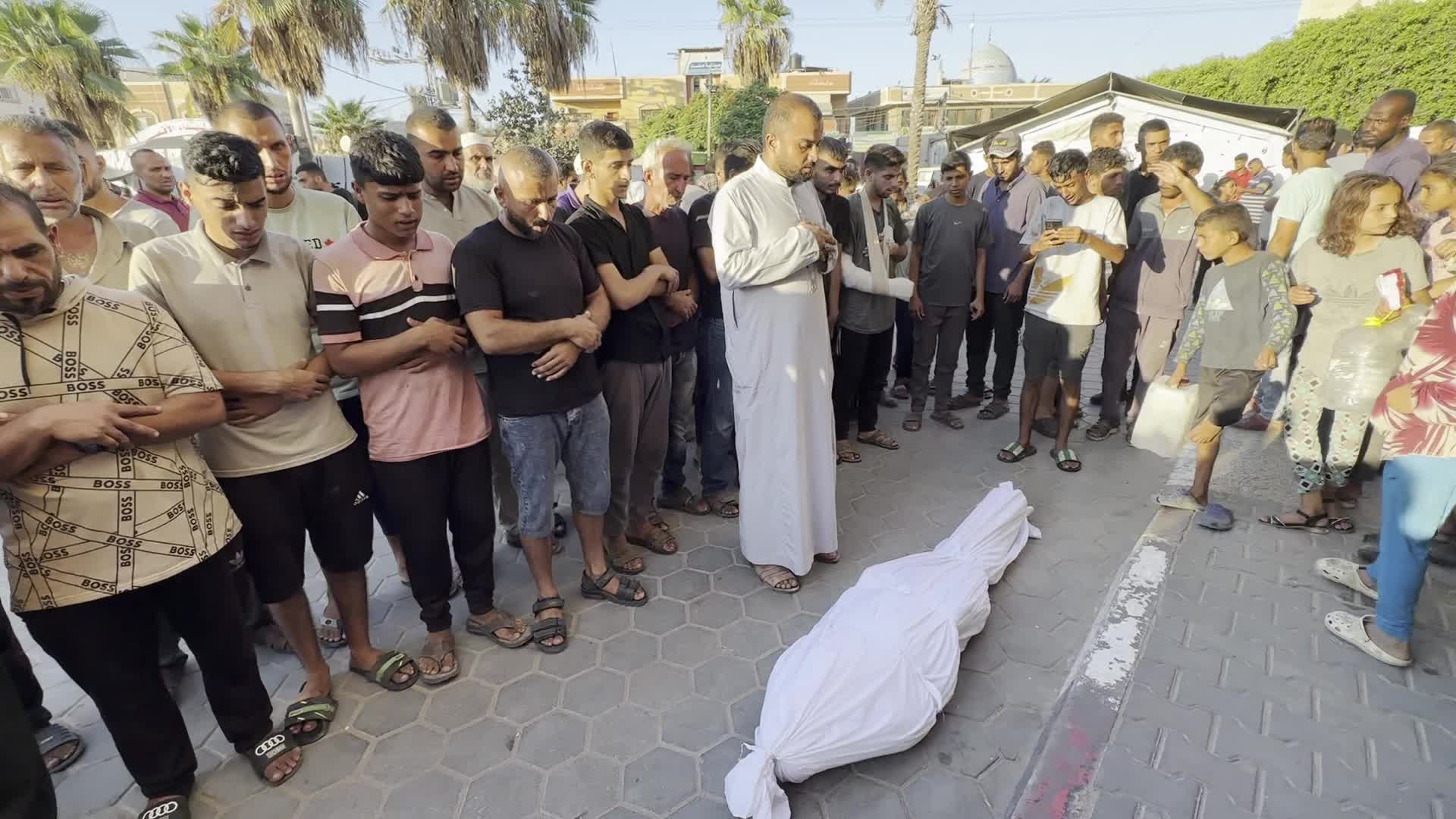 Palestinians Mourn Relatives Killed in Israeli Strike at Al-Aqsa Martyrs Hospital