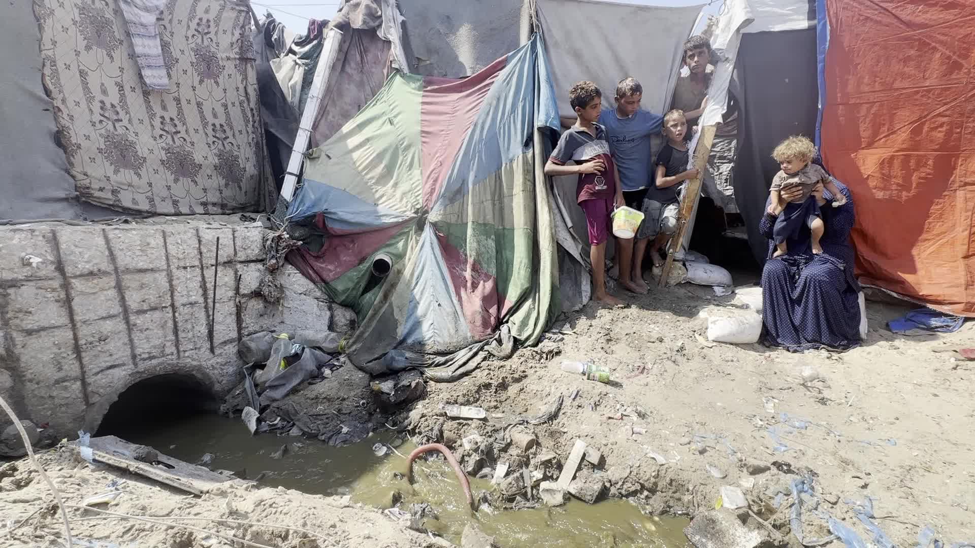 Displaced Palestinians Near Raw Sewage at Camp in Deir al-Balah, Gaza Strip