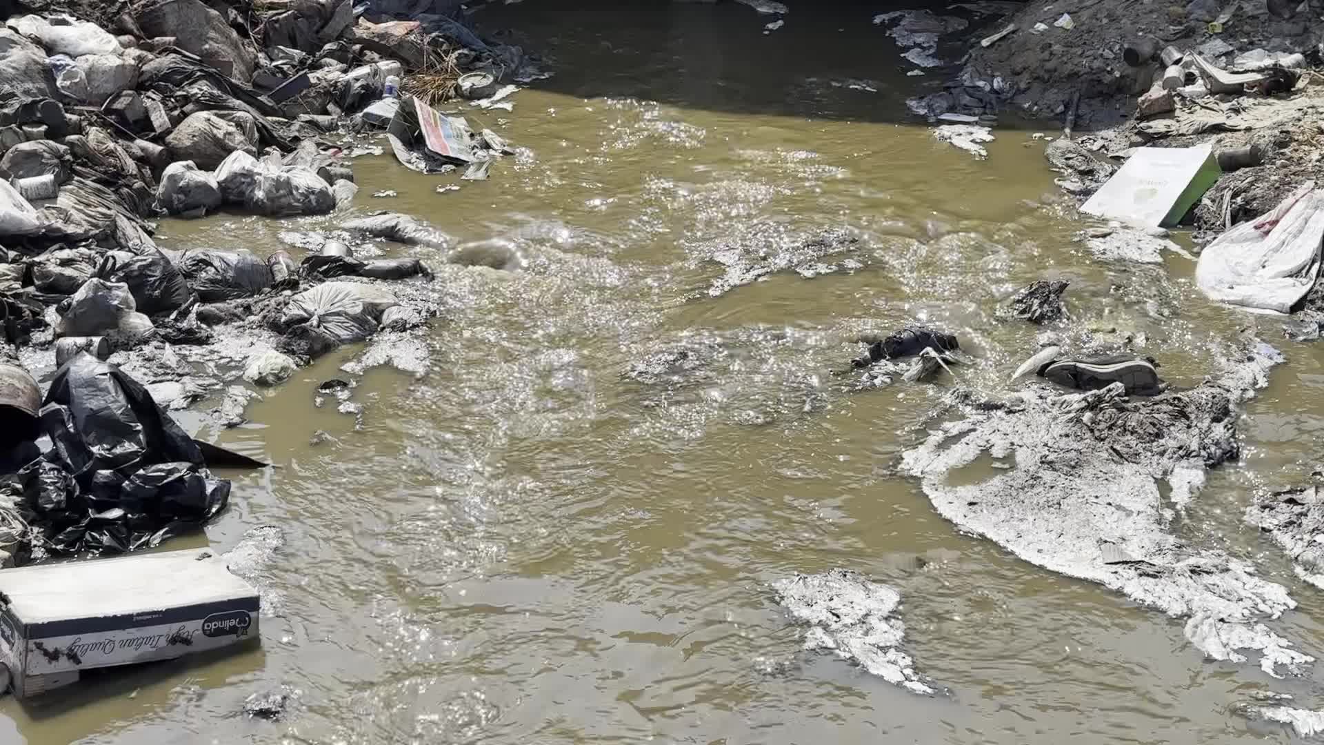 Displaced Palestinians Near Raw Sewage at Camp in Deir al-Balah, Gaza Strip