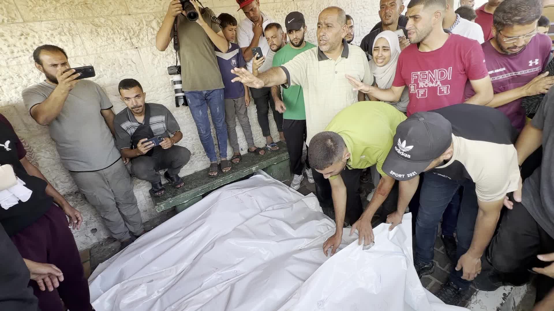 Palestinians Mourn Relatives Killed in Israeli Strike at Al-Aqsa Martyrs Hospital