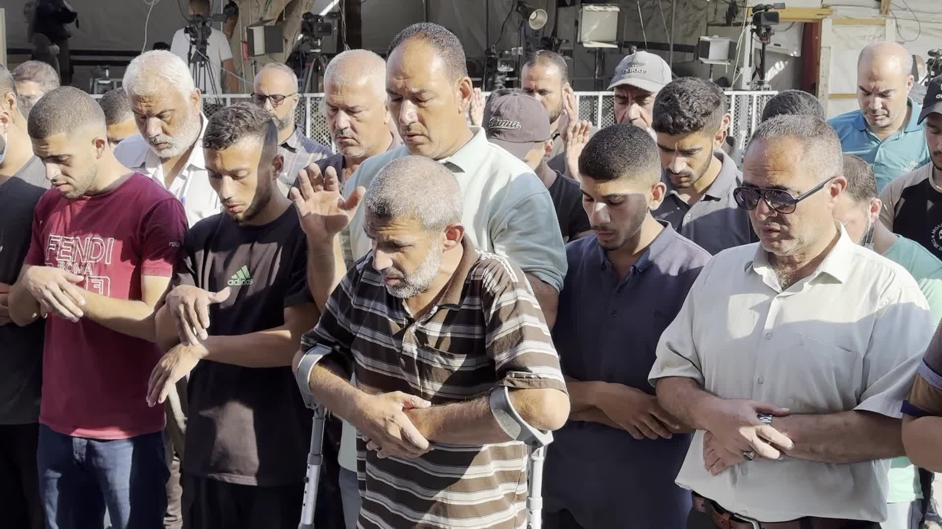 Palestinians Mourn Relatives Killed in Israeli Strike at Al-Aqsa Martyrs Hospital