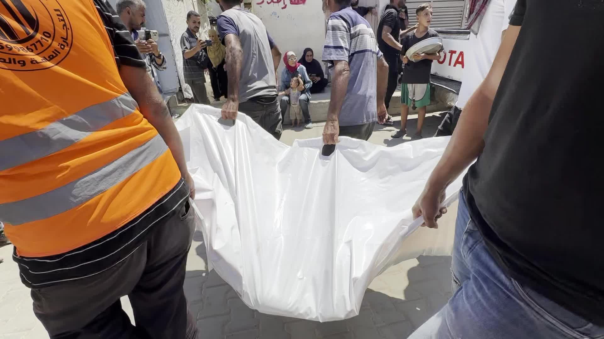 Palestinians Mourn Relatives Killed in Israeli Strike at Al-Aqsa Martyrs Hospital