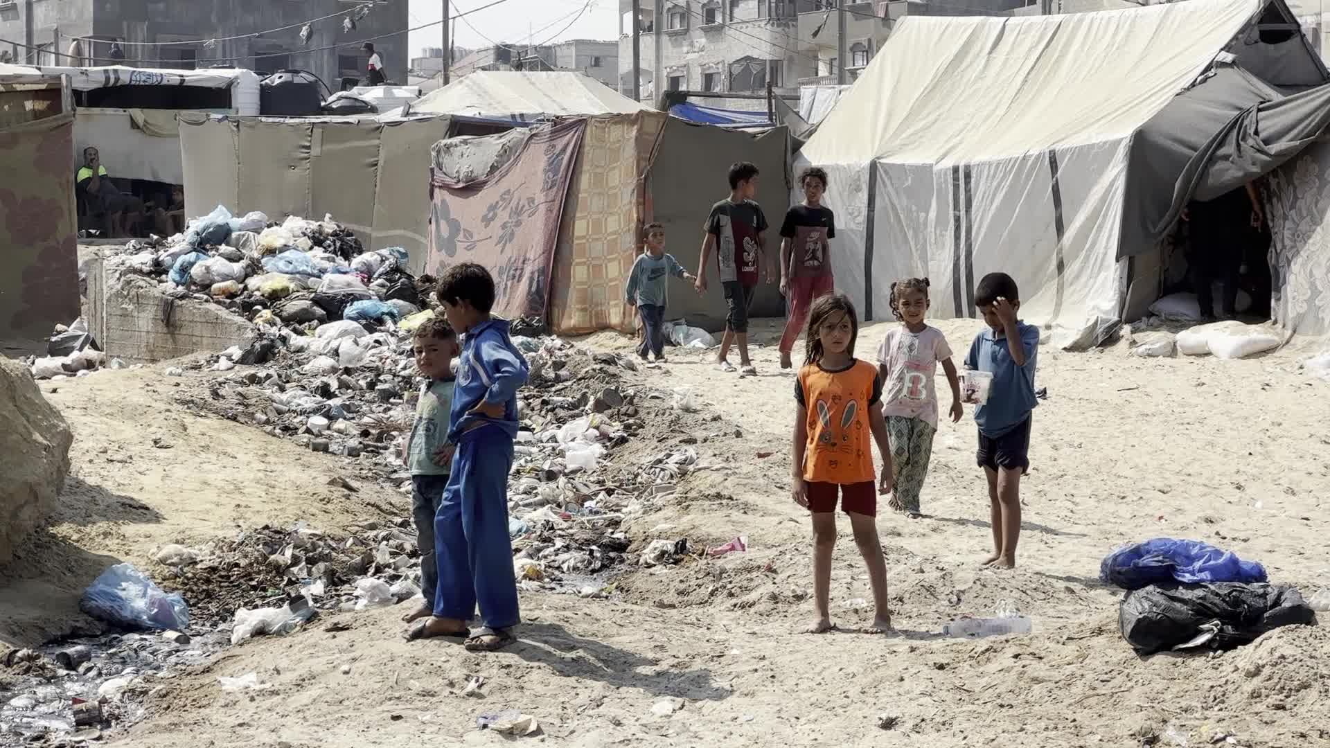 Displaced Palestinians Near Raw Sewage at Camp in Deir al-Balah, Gaza Strip