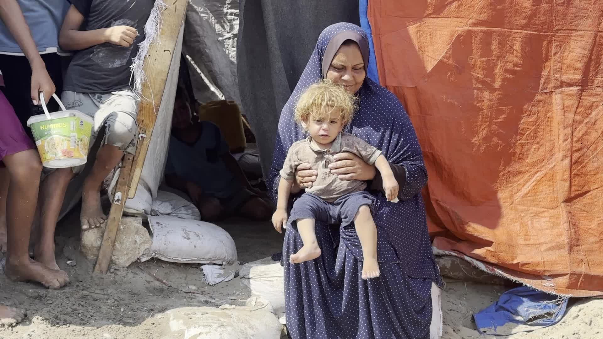 Displaced Palestinians Near Raw Sewage at Camp in Deir al-Balah, Gaza Strip