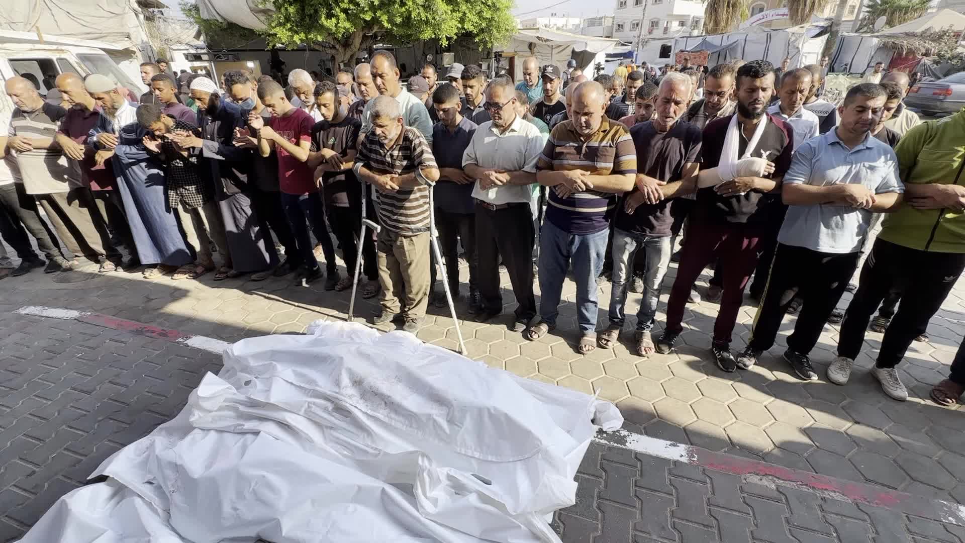 Palestinians Mourn Relatives Killed in Israeli Strike at Al-Aqsa Martyrs Hospital