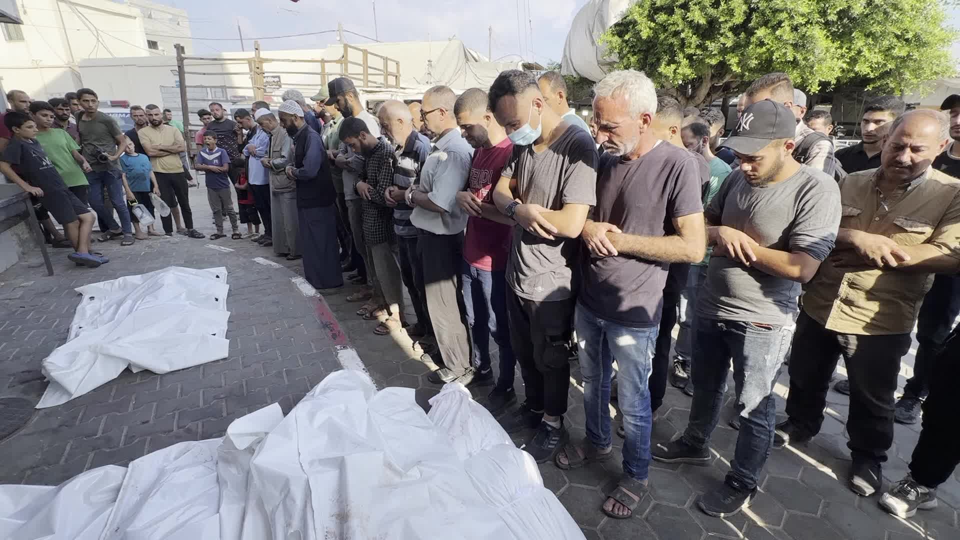 Palestinians Mourn Relatives Killed in Israeli Strike at Al-Aqsa Martyrs Hospital