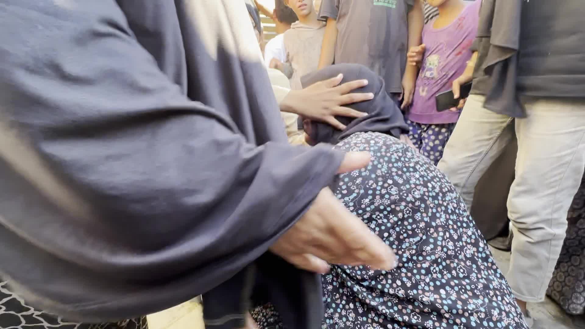 Palestinians Mourn Relatives Killed in Israeli Strike at Al-Aqsa Martyrs Hospital