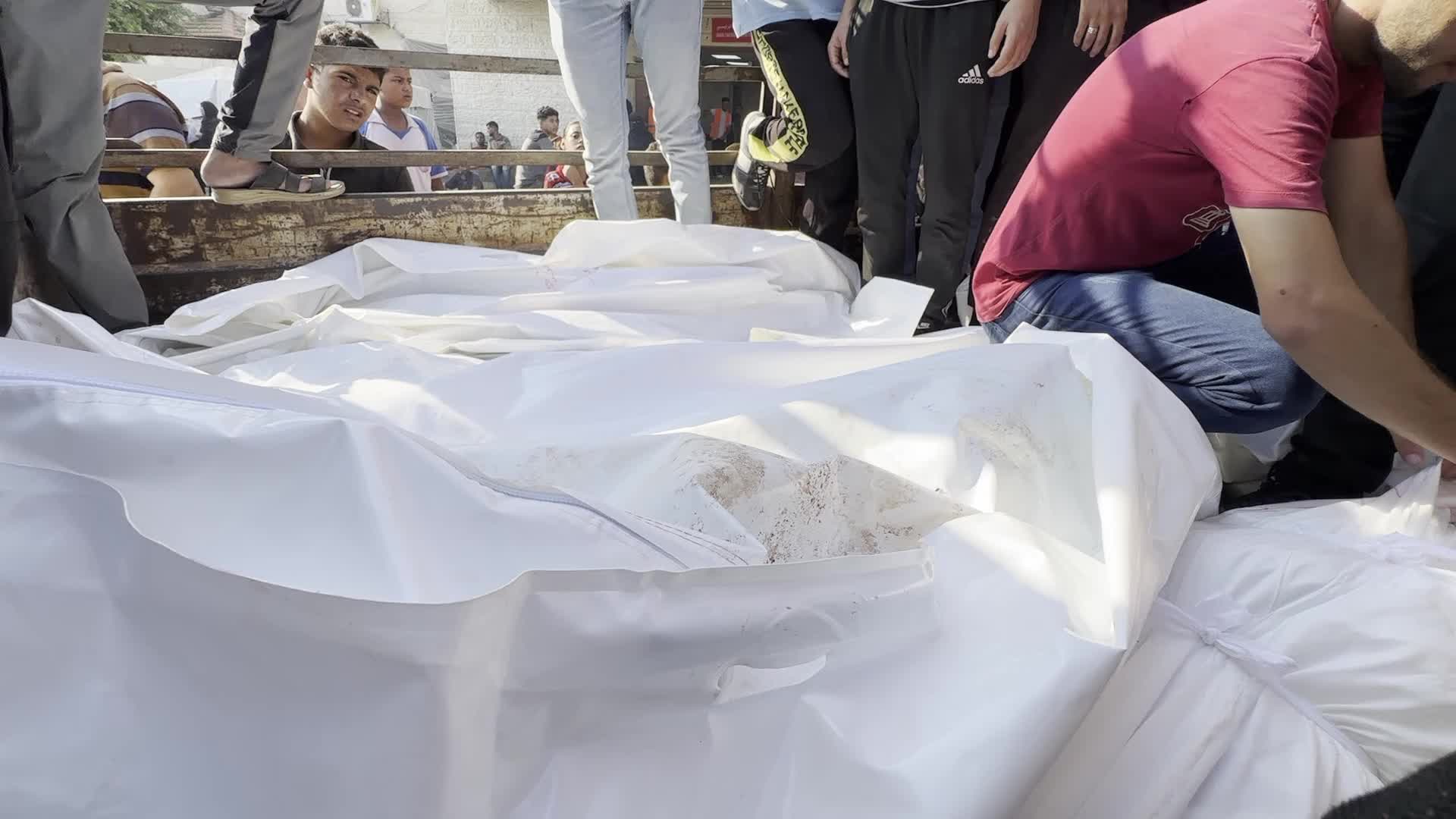 Palestinians Mourn Relatives Killed in Israeli Strike at Al-Aqsa Martyrs Hospital