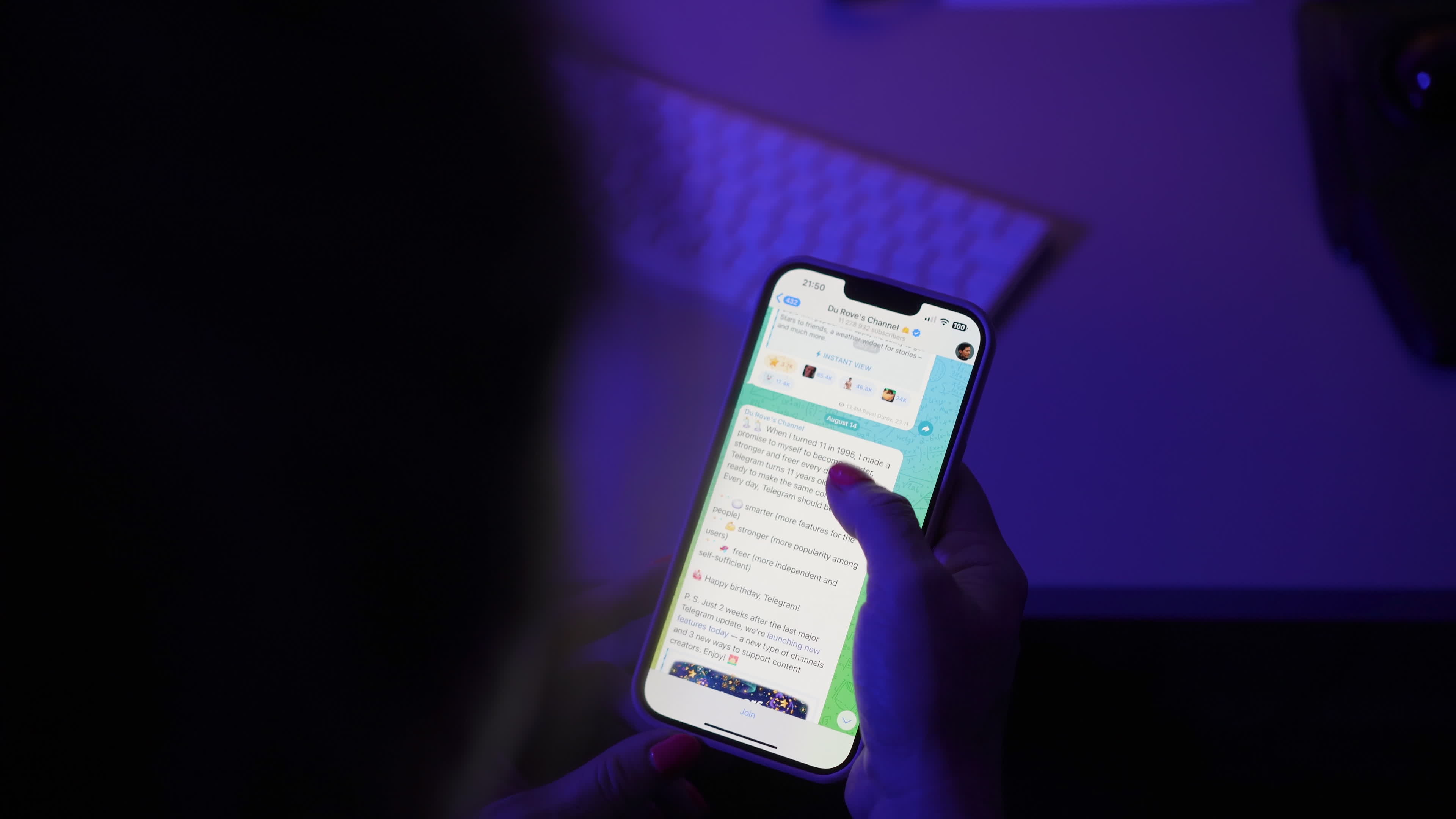 User with Telegram Messaging App on a Mobile Device