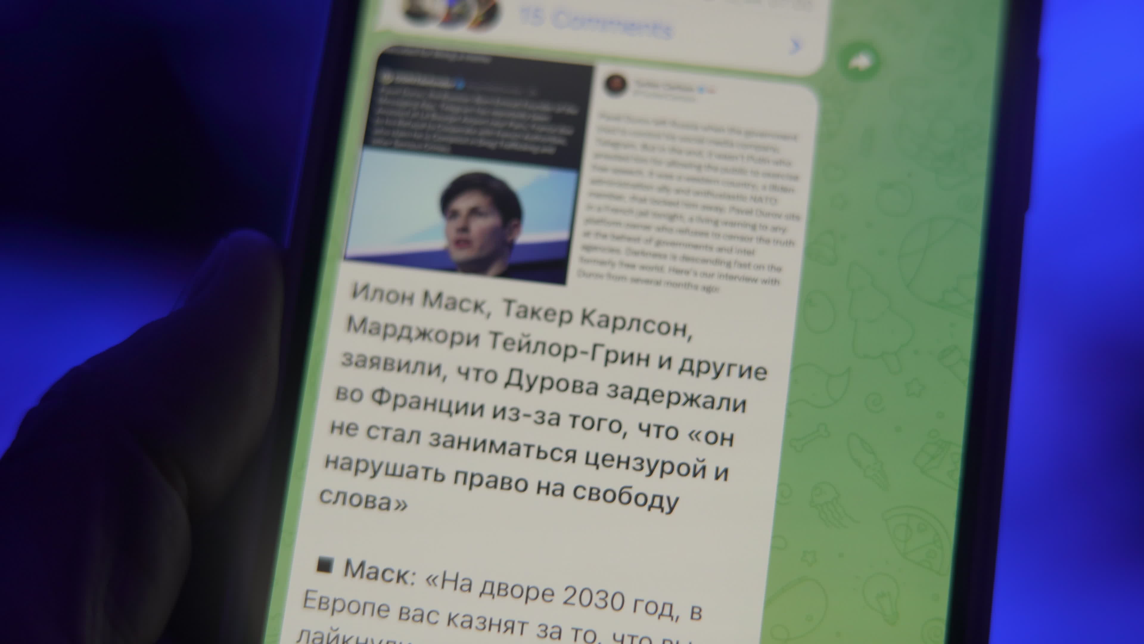 User with Telegram Messaging App on a Mobile Device