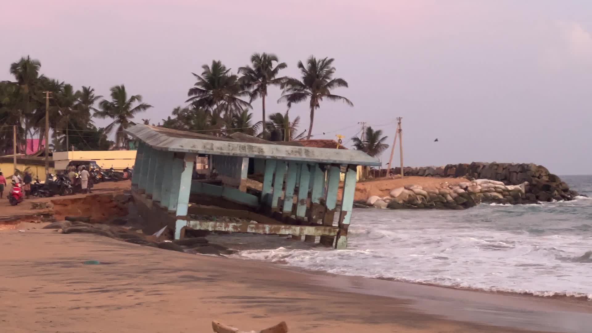 Platform destroyed by the strong ocean tides along Paruthiyoor Beach
