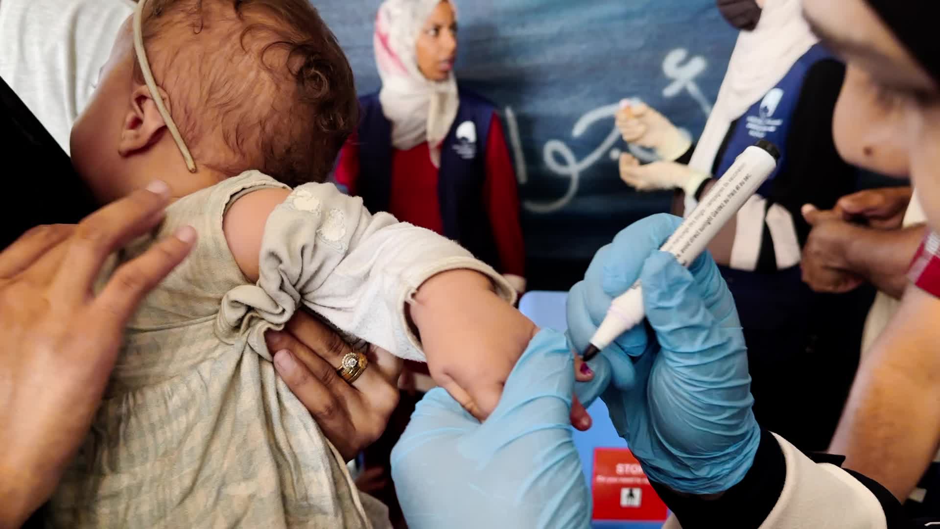 Palestinian Child Receives Polio Vaccination Amid Hamas-Israel Conflict