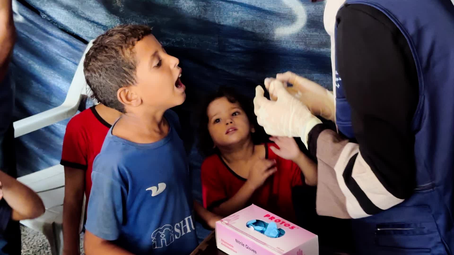 Palestinian Child Receives Polio Vaccination Amid Hamas-Israel Conflict
